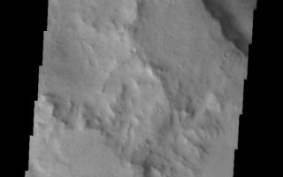 <h1>PIA05360:  Opportunity Has Landed!</h1><div class="PIA05360" lang="en" style="width:601px;text-align:left;margin:auto;background-color:#000;padding:10px;max-height:150px;overflow:auto;"><a href="/figures/PIA05360_context.jpg"></a><br /><p />Released 26 January 2004<p />Long before the MER landers were named or launched, the two orbiters at Mars were asked to examine landing sites. Both the Odyssey and Mars Global Surveyor spacecraft have been collecting landing site data for the past two years. The MGS and ODY data were used as part of the decision making process in the final selection of the two landing sites. The types of data collected by the two orbiters included not only images of the surface but also thermal data about the surface composition, atmospheric data about the climate at each location, and the tracking of major dust storms in the region prior to landing. The presence of, and data collected by, the MGS and ODY orbiters have proven invaluable in MER mission planning.<p />On Saturday, the Mars Exploration Rover Opportunity landed successfully in Meridiani Planum. This image should be slightly to the west of the landing spot, which should be in the flat area shown in the context image.<p />Image information: VIS instrument. Latitude -1.8, Longitude 352.1 East (7.9 West). 19 meter/pixel resolution.<p />Note: this THEMIS visual image has not been radiometrically nor geometrically calibrated for this preliminary release. An empirical correction has been performed to remove instrumental effects. A linear shift has been applied in the cross-track and down-track direction to approximate spacecraft and planetary motion. Fully calibrated and geometrically projected images will be released through the Planetary Data System in accordance with Project policies at a later time.<p />NASA's Jet Propulsion Laboratory manages the 2001 Mars Odyssey mission for NASA's Office of Space Science, Washington, D.C. The Thermal Emission Imaging System (THEMIS) was developed by Arizona State University, Tempe, in collaboration with Raytheon Santa Barbara Remote Sensing. The THEMIS investigation is led by Dr. Philip Christensen at Arizona State University. Lockheed Martin Astronautics, Denver, is the prime contractor for the Odyssey project, and developed and built the orbiter. Mission operations are conducted jointly from Lockheed Martin and from JPL, a division of the California Institute of Technology in Pasadena.<br /><br /><a href="http://photojournal.jpl.nasa.gov/catalog/PIA05360" onclick="window.open(this.href); return false;" title="Voir l'image 	 PIA05360:  Opportunity Has Landed!	  sur le site de la NASA">Voir l'image 	 PIA05360:  Opportunity Has Landed!	  sur le site de la NASA.</a></div>