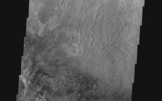 <h1>PIA05362:  Equatorial Crater in Meridiani</h1><div class="PIA05362" lang="en" style="width:523px;text-align:left;margin:auto;background-color:#000;padding:10px;max-height:150px;overflow:auto;"><a href="/figures/PIA05362_context.jpg"></a><br /><p />Released 28 January 2004<p />Long before the MER landers were named or launched, the two orbiters at Mars were asked to examine landing sites. Both the Odyssey and Mars Global Surveyor spacecraft have been collecting landing site data for the past two years. The MGS and ODY data were used as part of the decision making process in the final selection of the two landing sites. The types of data collected by the two orbiters included not only images of the surface but also thermal data about the surface composition, atmospheric data about the climate at each location, and the tracking of major dust storms in the region prior to landing. The presence of, and data collected by, the MGS and ODY orbiters have proven invaluable in MER mission planning.<p />This image shows layered material in a crater northwest of Opportunity's landing spot. It was captured on April 25, 2003, a few months before the MER landers launched.<p />Image information: VIS instrument. Latitude 0.9, Longitude 350.8 East (9.2 West). 19 meter/pixel resolution. <p /> Note: this THEMIS visual image has not been radiometrically nor geometrically calibrated for this preliminary release. An empirical correction has been performed to remove instrumental effects. A linear shift has been applied in the cross-track and down-track direction to approximate spacecraft and planetary motion. Fully calibrated and geometrically projected images will be released through the Planetary Data System in accordance with Project policies at a later time.<p />NASA's Jet Propulsion Laboratory manages the 2001 Mars Odyssey mission for NASA's Office of Space Science, Washington, D.C. The Thermal Emission Imaging System (THEMIS) was developed by Arizona State University, Tempe, in collaboration with Raytheon Santa Barbara Remote Sensing. The THEMIS investigation is led by Dr. Philip Christensen at Arizona State University. Lockheed Martin Astronautics, Denver, is the prime contractor for the Odyssey project, and developed and built the orbiter. Mission operations are conducted jointly from Lockheed Martin and from JPL, a division of the California Institute of Technology in Pasadena.<br /><br /><a href="http://photojournal.jpl.nasa.gov/catalog/PIA05362" onclick="window.open(this.href); return false;" title="Voir l'image 	 PIA05362:  Equatorial Crater in Meridiani	  sur le site de la NASA">Voir l'image 	 PIA05362:  Equatorial Crater in Meridiani	  sur le site de la NASA.</a></div>