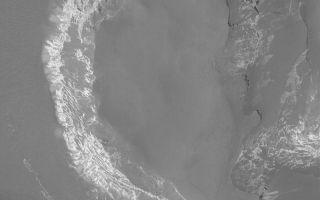 <h1>PIA05529:  Mesa in Capri Chasma</h1><div class="PIA05529" lang="en" style="width:800px;text-align:left;margin:auto;background-color:#000;padding:10px;max-height:150px;overflow:auto;">2 March 2004 <br />This Mars Global Surveyor (MGS) Mars Orbiter Camera (MOC) narrow angle picture shows light-toned, sedimentary rock outcrops forming the walls of a dark-topped mesa in Capri Chasma. Capri Chasma is at the east end of the vast Valles Marineris trough system. This image is located near 12.8°S, 48.1°W. This view covers an area 3 km (1.9 mi) wide and is illuminated by sunlight from the lower left.<br /><br /><a href="http://photojournal.jpl.nasa.gov/catalog/PIA05529" onclick="window.open(this.href); return false;" title="Voir l'image 	 PIA05529:  Mesa in Capri Chasma	  sur le site de la NASA">Voir l'image 	 PIA05529:  Mesa in Capri Chasma	  sur le site de la NASA.</a></div>