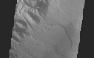 <h1>PIA05749:  Orson Welles Crater Dunes</h1><div class="PIA05749" lang="en" style="width:535px;text-align:left;margin:auto;background-color:#000;padding:10px;max-height:150px;overflow:auto;"><a href="/figures/PIA05749_fig1.jpg"> </a><br /><p>Released 14 April 2004</p><p>The Odyssey spacecraft has completed a full Mars year of observations of the red planet. For the next several weeks the Image of the Day will look back over this first mars year. It will focus on four themes: 1) the poles - with the seasonal changes seen in the retreat and expansion of the caps; 2) craters - with a variety of morphologies relating to impact materials and later alteration, both infilling and exhumation; 3) channels - the clues to liquid surface flow; and 4) volcanic flow features. While some images have helped answer questions about the history of Mars, many have raised new questions that are still being investigated as Odyssey continues collecting data as it orbits Mars.</p><p> This daytime VIS image was collected on November 13, 2003 during the southern summer season in Orson Welles Crater.</p><p>Image information: VIS instrument. Latitude -0, Longitude 313.4 East (46.6 West). 19 meter/pixel resolution.</p><p>Note: this THEMIS visual image has not been radiometrically nor geometrically calibrated for this preliminary release. An empirical correction has been performed to remove instrumental effects. A linear shift has been applied in the cross-track and down-track direction to approximate spacecraft and planetary motion. Fully calibrated and geometrically projected images will be released through the Planetary Data System in accordance with Project policies at a later time.</p><p>NASA's Jet Propulsion Laboratory manages the 2001 Mars Odyssey mission for NASA's Office of Space Science, Washington, D.C. The Thermal Emission Imaging System (THEMIS) was developed by Arizona State University, Tempe, in collaboration with Raytheon Santa Barbara Remote Sensing. The THEMIS investigation is led by Dr. Philip Christensen at Arizona State University. Lockheed Martin Astronautics, Denver, is the prime contractor for the Odyssey project, and developed and built the orbiter. Mission operations are conducted jointly from Lockheed Martin and from JPL, a division of the California Institute of Technology in Pasadena.</p><br /><br /><a href="http://photojournal.jpl.nasa.gov/catalog/PIA05749" onclick="window.open(this.href); return false;" title="Voir l'image 	 PIA05749:  Orson Welles Crater Dunes	  sur le site de la NASA">Voir l'image 	 PIA05749:  Orson Welles Crater Dunes	  sur le site de la NASA.</a></div>