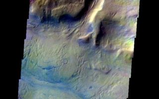 <h1>PIA05881:  Cut Crater in Reull Vallis</h1><div class="PIA05881" lang="en" style="width:590px;text-align:left;margin:auto;background-color:#000;padding:10px;max-height:150px;overflow:auto;"><a href="/figures/PIA05881_fig1.jpg"> </a><br /><p>Released 6 May 2004</br>This daytime visible color image was collected on May 24, 2002 during the Southern Fall season in Reull Vallis.</p><p>This daytime visible color image was collected on September 4, 2002 during the Northern Spring season in Vastitas Borealis. The THEMIS VIS camera is capable of capturing color images of the martian surface using its five different color filters. In this mode of operation, the spatial resolution and coverage of the image must be reduced to accommodate the additional data volume produced from the use of multiple filters. To make a color image, three of the five filter images (each in grayscale) are selected. Each is contrast enhanced and then converted to a red, green, or blue intensity image. These three images are then combined to produce a full color, single image. Because the THEMIS color filters don't span the full range of colors seen by the human eye, a color THEMIS image does not represent true color. Also, because each single-filter image is contrast enhanced before inclusion in the three-color image, the apparent color variation of the scene is exaggerated. Nevertheless, the color variation that does appear is representative of some change in color, however subtle, in the actual scene. Note that the long edges of THEMIS color images typically contain color artifacts that do not represent surface variation.</p><p>Image information: VIS instrument. Latitude -40.1, Longitude 99.1 East (260.9 West). 19 meter/pixel resolution.</p><p>Note: this THEMIS visual image has not been radiometrically nor geometrically calibrated for this preliminary release. An empirical correction has been performed to remove instrumental effects. A linear shift has been applied in the cross-track and down-track direction to approximate spacecraft and planetary motion. Fully calibrated and geometrically projected images will be released through the Planetary Data System in accordance with Project policies at a later time.</p><p>NASA's Jet Propulsion Laboratory manages the 2001 Mars Odyssey mission for NASA's Office of Space Science, Washington, D.C. The Thermal Emission Imaging System (THEMIS) was developed by Arizona State University, Tempe, in collaboration with Raytheon Santa Barbara Remote Sensing. The THEMIS investigation is led by Dr. Philip Christensen at Arizona State University. Lockheed Martin Astronautics, Denver, is the prime contractor for the Odyssey project, and developed and built the orbiter. Mission operations are conducted jointly from Lockheed Martin and from JPL, a division of the California Institute of Technology in Pasadena.</p><br /><br /><a href="http://photojournal.jpl.nasa.gov/catalog/PIA05881" onclick="window.open(this.href); return false;" title="Voir l'image 	 PIA05881:  Cut Crater in Reull Vallis	  sur le site de la NASA">Voir l'image 	 PIA05881:  Cut Crater in Reull Vallis	  sur le site de la NASA.</a></div>
