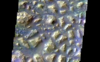 <h1>PIA05938:  Colored Chaos</h1><div class="PIA05938" lang="en" style="width:593px;text-align:left;margin:auto;background-color:#000;padding:10px;max-height:150px;overflow:auto;"><a href="/figures/PIA05938_fig1.jpg"> </a><br /><p>Released 7 May 2004</br>This daytime visible color image was collected on May 30, 2002 during the Southern Fall season in Atlantis Chaos.</p><p>The THEMIS VIS camera is capable of capturing color images of the martian surface using its five different color filters. In this mode of operation, the spatial resolution and coverage of the image must be reduced to accommodate the additional data volume produced from the use of multiple filters. To make a color image, three of the five filter images (each in grayscale) are selected. Each is contrast enhanced and then converted to a red, green, or blue intensity image. These three images are then combined to produce a full color, single image. Because the THEMIS color filters don't span the full range of colors seen by the human eye, a color THEMIS image does not represent true color. Also, because each single-filter image is contrast enhanced before inclusion in the three-color image, the apparent color variation of the scene is exaggerated. Nevertheless, the color variation that does appear is representative of some change in color, however subtle, in the actual scene. Note that the long edges of THEMIS color images typically contain color artifacts that do not represent surface variation.</p><p>Image information: VIS instrument. Latitude -34.5, Longitude 183.6 East (176.4 West). 38 meter/pixel resolution.</p><p>Note: this THEMIS visual image has not been radiometrically nor geometrically calibrated for this preliminary release. An empirical correction has been performed to remove instrumental effects. A linear shift has been applied in the cross-track and down-track direction to approximate spacecraft and planetary motion. Fully calibrated and geometrically projected images will be released through the Planetary Data System in accordance with Project policies at a later time.</p><p>NASA's Jet Propulsion Laboratory manages the 2001 Mars Odyssey mission for NASA's Office of Space Science, Washington, D.C. The Thermal Emission Imaging System (THEMIS) was developed by Arizona State University, Tempe, in collaboration with Raytheon Santa Barbara Remote Sensing. The THEMIS investigation is led by Dr. Philip Christensen at Arizona State University. Lockheed Martin Astronautics, Denver, is the prime contractor for the Odyssey project, and developed and built the orbiter. Mission operations are conducted jointly from Lockheed Martin and from JPL, a division of the California Institute of Technology in Pasadena.</p><br /><br /><a href="http://photojournal.jpl.nasa.gov/catalog/PIA05938" onclick="window.open(this.href); return false;" title="Voir l'image 	 PIA05938:  Colored Chaos	  sur le site de la NASA">Voir l'image 	 PIA05938:  Colored Chaos	  sur le site de la NASA.</a></div>