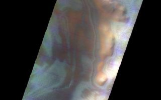 <h1>PIA05970:  Psychedelic Crater Rim</h1><div class="PIA05970" lang="en" style="width:777px;text-align:left;margin:auto;background-color:#000;padding:10px;max-height:150px;overflow:auto;"><a href="/figures/PIA05970_fig1.jpg"> </a><br /><p>Released 11 May 2004</br>This daytime visible color image was collected on June 1, 2003 during the Southern Spring season in Noachis Terra.</p><p>The THEMIS VIS camera is capable of capturing color images of the martian surface using its five different color filters. In this mode of operation, the spatial resolution and coverage of the image must be reduced to accommodate the additional data volume produced from the use of multiple filters. To make a color image, three of the five filter images (each in grayscale) are selected. Each is contrast enhanced and then converted to a red, green, or blue intensity image. These three images are then combined to produce a full color, single image. Because the THEMIS color filters don't span the full range of colors seen by the human eye, a color THEMIS image does not represent true color. Also, because each single-filter image is contrast enhanced before inclusion in the three-color image, the apparent color variation of the scene is exaggerated. Nevertheless, the color variation that does appear is representative of some change in color, however subtle, in the actual scene. Note that the long edges of THEMIS color images typically contain color artifacts that do not represent surface variation.</p><p>Image information: VIS instrument. Latitude -79.7, Longitude 237.3 East (122.7 West). 38 meter/pixel resolution.</p><p>Note: this THEMIS visual image has not been radiometrically nor geometrically calibrated for this preliminary release. An empirical correction has been performed to remove instrumental effects. A linear shift has been applied in the cross-track and down-track direction to approximate spacecraft and planetary motion. Fully calibrated and geometrically projected images will be released through the Planetary Data System in accordance with Project policies at a later time.</p><p>NASA's Jet Propulsion Laboratory manages the 2001 Mars Odyssey mission for NASA's Office of Space Science, Washington, D.C. The Thermal Emission Imaging System (THEMIS) was developed by Arizona State University, Tempe, in collaboration with Raytheon Santa Barbara Remote Sensing. The THEMIS investigation is led by Dr. Philip Christensen at Arizona State University. Lockheed Martin Astronautics, Denver, is the prime contractor for the Odyssey project, and developed and built the orbiter. Mission operations are conducted jointly from Lockheed Martin and from JPL, a division of the California Institute of Technology in Pasadena.</p><br /><br /><a href="http://photojournal.jpl.nasa.gov/catalog/PIA05970" onclick="window.open(this.href); return false;" title="Voir l'image 	 PIA05970:  Psychedelic Crater Rim	  sur le site de la NASA">Voir l'image 	 PIA05970:  Psychedelic Crater Rim	  sur le site de la NASA.</a></div>