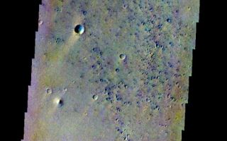 <h1>PIA05973:  Pathfinder Landing Site in Color</h1><div class="PIA05973" lang="en" style="width:611px;text-align:left;margin:auto;background-color:#000;padding:10px;max-height:150px;overflow:auto;"><a href="/figures/PIA05973_fig1.jpg"> </a><br /><p>Released 14 May 2004</br>This image of the Mars Pathfinder Landing site was acquired July 17, 2002, during northern spring.</p><p>The THEMIS VIS camera is capable of capturing color images of the martian surface using its five different color filters. In this mode of operation, the spatial resolution and coverage of the image must be reduced to accommodate the additional data volume produced from the use of multiple filters. To make a color image, three of the five filter images (each in grayscale) are selected. Each is contrast enhanced and then converted to a red, green, or blue intensity image. These three images are then combined to produce a full color, single image. Because the THEMIS color filters don't span the full range of colors seen by the human eye, a color THEMIS image does not represent true color. Also, because each single-filter image is contrast enhanced before inclusion in the three-color image, the apparent color variation of the scene is exaggerated. Nevertheless, the color variation that does appear is representative of some change in color, however subtle, in the actual scene. Note that the long edges of THEMIS color images typically contain color artifacts that do not represent surface variation.</p><p>Image information: VIS instrument. Latitude 19.4, Longitude 326.8 East (33.2 West). 38 meter/pixel resolution.</p><p>Note: this THEMIS visual image has not been radiometrically nor geometrically calibrated for this preliminary release. An empirical correction has been performed to remove instrumental effects. A linear shift has been applied in the cross-track and down-track direction to approximate spacecraft and planetary motion. Fully calibrated and geometrically projected images will be released through the Planetary Data System in accordance with Project policies at a later time.</p><p>NASA's Jet Propulsion Laboratory manages the 2001 Mars Odyssey mission for NASA's Office of Space Science, Washington, D.C. The Thermal Emission Imaging System (THEMIS) was developed by Arizona State University, Tempe, in collaboration with Raytheon Santa Barbara Remote Sensing. The THEMIS investigation is led by Dr. Philip Christensen at Arizona State University. Lockheed Martin Astronautics, Denver, is the prime contractor for the Odyssey project, and developed and built the orbiter. Mission operations are conducted jointly from Lockheed Martin and from JPL, a division of the California Institute of Technology in Pasadena.</p><br /><br /><a href="http://photojournal.jpl.nasa.gov/catalog/PIA05973" onclick="window.open(this.href); return false;" title="Voir l'image 	 PIA05973:  Pathfinder Landing Site in Color	  sur le site de la NASA">Voir l'image 	 PIA05973:  Pathfinder Landing Site in Color	  sur le site de la NASA.</a></div>