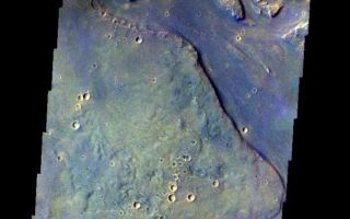<h1>PIA05976:  Tinjar Vallis</h1><div class="PIA05976" lang="en" style="width:610px;text-align:left;margin:auto;background-color:#000;padding:10px;max-height:150px;overflow:auto;"><a href="/figures/PIA05976_fig1.jpg"> </a><br /><p>Released 19 May 2004</br>This image of Tinjar Vallis was acquired Oct. 20, 2002, during northern spring.</p><p>The THEMIS VIS camera is capable of capturing color images of the martian surface using its five different color filters. In this mode of operation, the spatial resolution and coverage of the image must be reduced to accommodate the additional data volume produced from the use of multiple filters. To make a color image, three of the five filter images (each in grayscale) are selected. Each is contrast enhanced and then converted to a red, green, or blue intensity image. These three images are then combined to produce a full color, single image. Because the THEMIS color filters don't span the full range of colors seen by the human eye, a color THEMIS image does not represent true color. Also, because each single-filter image is contrast enhanced before inclusion in the three-color image, the apparent color variation of the scene is exaggerated. Nevertheless, the color variation that does appear is representative of some change in color, however subtle, in the actual scene. Note that the long edges of THEMIS color images typically contain color artifacts that do not represent surface variation.</p><p>Image information: VIS instrument. Latitude 28.2, Longitude 131.6 East (228.4 West). 38 meter/pixel resolution.</p><p>Note: this THEMIS visual image has not been radiometrically nor geometrically calibrated for this preliminary release. An empirical correction has been performed to remove instrumental effects. A linear shift has been applied in the cross-track and down-track direction to approximate spacecraft and planetary motion. Fully calibrated and geometrically projected images will be released through the Planetary Data System in accordance with Project policies at a later time.</p><p>NASA's Jet Propulsion Laboratory manages the 2001 Mars Odyssey mission for NASA's Office of Space Science, Washington, D.C. The Thermal Emission Imaging System (THEMIS) was developed by Arizona State University, Tempe, in collaboration with Raytheon Santa Barbara Remote Sensing. The THEMIS investigation is led by Dr. Philip Christensen at Arizona State University. Lockheed Martin Astronautics, Denver, is the prime contractor for the Odyssey project, and developed and built the orbiter. Mission operations are conducted jointly from Lockheed Martin and from JPL, a division of the California Institute of Technology in Pasadena.</p><br /><br /><a href="http://photojournal.jpl.nasa.gov/catalog/PIA05976" onclick="window.open(this.href); return false;" title="Voir l'image 	 PIA05976:  Tinjar Vallis	  sur le site de la NASA">Voir l'image 	 PIA05976:  Tinjar Vallis	  sur le site de la NASA.</a></div>