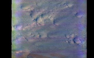 <h1>PIA06005:  South Polar Cap</h1><div class="PIA06005" lang="en" style="width:436px;text-align:left;margin:auto;background-color:#000;padding:10px;max-height:150px;overflow:auto;"><a href="/figures/PIA06005_fig1.jpg"> </a><br /><p>Released 28 May 2004</br>This image was collected February 29, 2004 during the end of southern summer season. The local time at the location of the image was about 2 pm. The image shows an area in the South Polar region.</p><p>The THEMIS VIS camera is capable of capturing color images of the martian surface using its five different color filters. In this mode of operation, the spatial resolution and coverage of the image must be reduced to accommodate the additional data volume produced from the use of multiple filters. To make a color image, three of the five filter images (each in grayscale) are selected. Each is contrast enhanced and then converted to a red, green, or blue intensity image. These three images are then combined to produce a full color, single image. Because the THEMIS color filters don't span the full range of colors seen by the human eye, a color THEMIS image does not represent true color. Also, because each single-filter image is contrast enhanced before inclusion in the three-color image, the apparent color variation of the scene is exaggerated. Nevertheless, the color variation that does appear is representative of some change in color, however subtle, in the actual scene. Note that the long edges of THEMIS color images typically contain color artifacts that do not represent surface variation.</p><p>Image information: VIS instrument. Latitude -84.7, Longitude 9.3 East (350.7 West). 38 meter/pixel resolution.</p><p>Note: this THEMIS visual image has not been radiometrically nor geometrically calibrated for this preliminary release. An empirical correction has been performed to remove instrumental effects. A linear shift has been applied in the cross-track and down-track direction to approximate spacecraft and planetary motion. Fully calibrated and geometrically projected images will be released through the Planetary Data System in accordance with Project policies at a later time.</p><p>NASA's Jet Propulsion Laboratory manages the 2001 Mars Odyssey mission for NASA's Office of Space Science, Washington, D.C. The Thermal Emission Imaging System (THEMIS) was developed by Arizona State University, Tempe, in collaboration with Raytheon Santa Barbara Remote Sensing. The THEMIS investigation is led by Dr. Philip Christensen at Arizona State University. Lockheed Martin Astronautics, Denver, is the prime contractor for the Odyssey project, and developed and built the orbiter. Mission operations are conducted jointly from Lockheed Martin and from JPL, a division of the California Institute of Technology in Pasadena.</p><br /><br /><a href="http://photojournal.jpl.nasa.gov/catalog/PIA06005" onclick="window.open(this.href); return false;" title="Voir l'image 	 PIA06005:  South Polar Cap	  sur le site de la NASA">Voir l'image 	 PIA06005:  South Polar Cap	  sur le site de la NASA.</a></div>