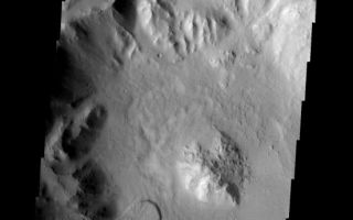 <h1>PIA06088:  Crater Landslide</h1><div class="PIA06088" lang="en" style="width:552px;text-align:left;margin:auto;background-color:#000;padding:10px;max-height:150px;overflow:auto;"><p><a href="/figures/PIA06088_fig1.jpg"></a><br><b>Context image for PIA06088<br />Crater Landslide</b></p><p>This landslide occurs in an unnamed crater southeast of Millochau Crater.<p>Image information: VIS instrument. Latitude -24.4N, Longitude 87.5E. 17 meter/pixel resolution.</p><p>Note: this THEMIS visual image has not been radiometrically nor geometrically calibrated for this preliminary release. An empirical correction has been performed to remove instrumental effects. A linear shift has been applied in the cross-track and down-track direction to approximate spacecraft and planetary motion. Fully calibrated and geometrically projected images will be released through the Planetary Data System in accordance with Project policies at a later time.</p><p>NASA's Jet Propulsion Laboratory manages the 2001 Mars Odyssey mission for NASA's Office of Space Science, Washington, D.C. The Thermal Emission Imaging System (THEMIS) was developed by Arizona State University, Tempe, in collaboration with Raytheon Santa Barbara Remote Sensing. The THEMIS investigation is led by Dr. Philip Christensen at Arizona State University. Lockheed Martin Astronautics, Denver, is the prime contractor for the Odyssey project, and developed and built the orbiter. Mission operations are conducted jointly from Lockheed Martin and from JPL, a division of the California Institute of Technology in Pasadena.</p><br /><br /><a href="http://photojournal.jpl.nasa.gov/catalog/PIA06088" onclick="window.open(this.href); return false;" title="Voir l'image 	 PIA06088:  Crater Landslide	  sur le site de la NASA">Voir l'image 	 PIA06088:  Crater Landslide	  sur le site de la NASA.</a></div>
