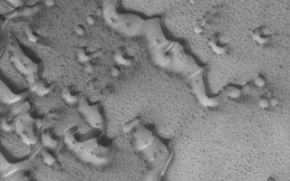 <h1>PIA06290:  Dunes with Frost</h1><div class="PIA06290" lang="en" style="width:672px;text-align:left;margin:auto;background-color:#000;padding:10px;max-height:150px;overflow:auto;"><p>31 May 2004<br />Springtime for the martian northern hemisphere brings defrosting spots and patterns to the north polar dune fields. This Mars Global Surveyor (MGS) Mars Orbiter Camera (MOC) image shows an example located near 76.7°N, 250.4°W. In summer, these dunes would be darker than their surroundings. However, while they are still covered by frost, they are not any darker than the substrate across which the sand is slowly traveling. Dune movement in this case is dominated by winds that blow from the southwest (lower left) toward the northeast (upper right). The picure covers an area about 3 km (1.9 mi) across and is illuminated by sunlight from the lower left.</p><br /><br /><a href="http://photojournal.jpl.nasa.gov/catalog/PIA06290" onclick="window.open(this.href); return false;" title="Voir l'image 	 PIA06290:  Dunes with Frost	  sur le site de la NASA">Voir l'image 	 PIA06290:  Dunes with Frost	  sur le site de la NASA.</a></div>