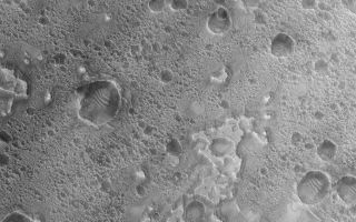 <h1>PIA06378:  Nili Buttes and Mesas</h1><div class="PIA06378" lang="en" style="width:672px;text-align:left;margin:auto;background-color:#000;padding:10px;max-height:150px;overflow:auto;"><p>11 July 2004<br />This Mars Global Surveyor (MGS) Mars Orbiter Camera (MOC) image shows small buttes and irregular mesas on the floor of a crater in the Nili Fossae region of Mars. Considerable erosion in the Nili Fossae region has exposed layered rocks and stripped materials away, revealing long-buried landforms and more ancient landscapes. This image is located near 24.3°N, 279.8°W. It covers an area about 3 km (1.9 mi) wide and is illuminated by sunlight from the lower left.</p><br /><br /><a href="http://photojournal.jpl.nasa.gov/catalog/PIA06378" onclick="window.open(this.href); return false;" title="Voir l'image 	 PIA06378:  Nili Buttes and Mesas	  sur le site de la NASA">Voir l'image 	 PIA06378:  Nili Buttes and Mesas	  sur le site de la NASA.</a></div>