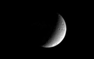 <h1>PIA06590:  Slice of Tethys</h1><div class="PIA06590" lang="en" style="width:464px;text-align:left;margin:auto;background-color:#000;padding:10px;max-height:150px;overflow:auto;"><p>This Cassini view of Saturn's moon Tethys shows several large craters near the moon's eastern limb. These craters have fanciful names such as Phemius, Polyphemus and Ajax. The moon's massive rift-like canyon system, Ithaca Chasma, is in the darkness to the west. Tethys is 1,071 kilometers (665 miles) across.</p><p>The image has been rotated so that north on Tethys is up. This view shows mainly the moon's trailing hemisphere.</p><p>The image was taken in visible blue light with the Cassini spacecraft narrow angle camera on Jan. 19, 2005, at a distance of approximately 1.9 million kilometers (1.2 million miles) from Tethys and at a Sun-Tethys-spacecraft, or phase, angle of 111 degrees. Resolution in the original image was 11 kilometers (7 miles) per pixel. The image has been contrast-enhanced and magnified by a factor of two to aid visibility.</p><p>The Cassini-Huygens mission is a cooperative project of NASA, the European Space Agency and the Italian Space Agency. The Jet Propulsion Laboratory, a division of the California Institute of Technology in Pasadena, manages the mission for NASA's Science Mission Directorate, Washington, D.C. The Cassini orbiter and its two onboard cameras were designed, developed and assembled at JPL. The imaging team is based at the Space Science Institute, Boulder, Colo.</p><p>For more information about the Cassini-Huygens mission, visit <a href="http://saturn.jpl.nasa.gov">http://saturn.jpl.nasa.gov</a> and the Cassini imaging team home page, <a href="http://ciclops.org">http://ciclops.org</a>.</p><br /><br /><a href="http://photojournal.jpl.nasa.gov/catalog/PIA06590" onclick="window.open(this.href); return false;" title="Voir l'image 	 PIA06590:  Slice of Tethys	  sur le site de la NASA">Voir l'image 	 PIA06590:  Slice of Tethys	  sur le site de la NASA.</a></div>