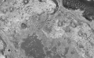 <h1>PIA06743:  Meridiani Outcrops</h1><div class="PIA06743" lang="en" style="width:800px;text-align:left;margin:auto;background-color:#000;padding:10px;max-height:150px;overflow:auto;"><p>31 July 2004<br />The sedimentary rock outcrops explored this year by the Mars Exploration Rover, Opportunity, in Meridiani Planum are just the "tip of the iceberg." Northern Sinus Meridiani exhibits vast outcrops of sedimentary rock of widely varied erosional characteristics and physical properties. Investigation of these rocks from orbit using the high resolution capabilities of the Mars Global Surveyor (MGS) Mars Orbiter Camera (MOC) has been underway for nearly seven years. This MGS MOC image shows an example, complete with small buttes formed of eroded sedimentary rock, in northern Sinus Meridiani. The image is located near 1.2°N, 358.9°W, and covers an area about 3 km (1.9 mi) across. Sunlight illuminates the terrain from the left.</p><br /><br /><a href="http://photojournal.jpl.nasa.gov/catalog/PIA06743" onclick="window.open(this.href); return false;" title="Voir l'image 	 PIA06743:  Meridiani Outcrops	  sur le site de la NASA">Voir l'image 	 PIA06743:  Meridiani Outcrops	  sur le site de la NASA.</a></div>