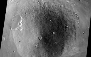 <h1>PIA06827:  Hecate Tholus</h1><div class="PIA06827" lang="en" style="width:800px;text-align:left;margin:auto;background-color:#000;padding:10px;max-height:150px;overflow:auto;"><a href="/figures/PIA06827_fig1.jpg"> </a><br /><p>Released August 20, 2004</br>The THEMIS Image of the Day will be exploring the <a href="/catalog/PIA06821">nomenclature of Mars</a> for the next three weeks.</p><p>Hecate Tholus</br>Tholus: small dome-shaped mountain or hillHecate: Goddess of the crossroads, ghosts and witchcraft. She has three heads (a dog, a snake, and a horse) that face three different directions. She is served by 2 ghost hounds.</p><p>Hecates Tholus is a volcano located north of Elysium Mons. The image above is a mosaic of daytime IR images.</p><p><b>Nomenclature Fact of the Day:</b> Many features on Io, a volcanically active moon of Jupiter, are named for fire, sun, volcano, and thunder goods and goddesses -- or for people and places from Dante's Inferno.</p><p>Image information: IR instrument. Latitude 29.1, Longitude 149 East (211 West). 100 meter/pixel resolution.</p><p>Note: this THEMIS visual image has not been radiometrically nor geometrically calibrated for this preliminary release. An empirical correction has been performed to remove instrumental effects. A linear shift has been applied in the cross-track and down-track direction to approximate spacecraft and planetary motion. Fully calibrated and geometrically projected images will be released through the Planetary Data System in accordance with Project policies at a later time.</p><p>NASA's Jet Propulsion Laboratory manages the 2001 Mars Odyssey mission for NASA's Office of Space Science, Washington, D.C. The Thermal Emission Imaging System (THEMIS) was developed by Arizona State University, Tempe, in collaboration with Raytheon Santa Barbara Remote Sensing. The THEMIS investigation is led by Dr. Philip Christensen at Arizona State University. Lockheed Martin Astronautics, Denver, is the prime contractor for the Odyssey project, and developed and built the orbiter. Mission operations are conducted jointly from Lockheed Martin and from JPL, a division of the California Institute of Technology in Pasadena.</p><br /><br /><a href="http://photojournal.jpl.nasa.gov/catalog/PIA06827" onclick="window.open(this.href); return false;" title="Voir l'image 	 PIA06827:  Hecate Tholus	  sur le site de la NASA">Voir l'image 	 PIA06827:  Hecate Tholus	  sur le site de la NASA.</a></div>