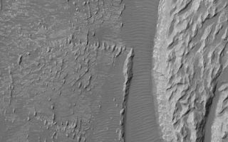 <h1>PIA06964:  Arsinoes Chaos Landforms</h1><div class="PIA06964" lang="en" style="width:467px;text-align:left;margin:auto;background-color:#000;padding:10px;max-height:150px;overflow:auto;"><p>23 October 2004<br >This Mars Global Surveyor (MGS) Mars Orbiter Camera (MOC) image shows light-toned rock outcrops, possibly sedimentary rocks, in the Arsinoes Chaos region east of the Valles Marineris trough system. These rocky materials were once below the martian surface. These features are located near 7.2°S, 27.9°W. The image covers an area about 3 km (1.9 mi) wide. Sunlight illuminates the scene from the upper left.</p><br /><br /><a href="http://photojournal.jpl.nasa.gov/catalog/PIA06964" onclick="window.open(this.href); return false;" title="Voir l'image 	 PIA06964:  Arsinoes Chaos Landforms	  sur le site de la NASA">Voir l'image 	 PIA06964:  Arsinoes Chaos Landforms	  sur le site de la NASA.</a></div>