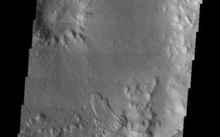 <h1>PIA07286:  Terra Cimmeria Crater Landslide</h1><div class="PIA07286" lang="en" style="width:606px;text-align:left;margin:auto;background-color:#000;padding:10px;max-height:150px;overflow:auto;"><p><a href="/figures/PIA07286_fig1.jpg"> </a><br /><p>The landslide in this VIS image is located inside an impact crater in the Terra Cimmeria region of Mars. The unnamed crater hosting this image is just east of Molesworth Crater.</p><p>Image information: VIS instrument. Latitude -27.7, Longitude 152 East (208 West). 19 meter/pixel resolution.</p><p>Note: this THEMIS visual image has not been radiometrically nor geometrically calibrated for this preliminary release. An empirical correction has been performed to remove instrumental effects. A linear shift has been applied in the cross-track and down-track direction to approximate spacecraft and planetary motion. Fully calibrated and geometrically projected images will be released through the Planetary Data System in accordance with Project policies at a later time.</p><p>NASA's Jet Propulsion Laboratory manages the 2001 Mars Odyssey mission for NASA's Office of Space Science, Washington, D.C. The Thermal Emission Imaging System (THEMIS) was developed by Arizona State University, Tempe, in collaboration with Raytheon Santa Barbara Remote Sensing. The THEMIS investigation is led by Dr. Philip Christensen at Arizona State University. Lockheed Martin Astronautics, Denver, is the prime contractor for the Odyssey project, and developed and built the orbiter. Mission operations are conducted jointly from Lockheed Martin and from JPL, a division of the California Institute of Technology in Pasadena.</p><br /><br /><a href="http://photojournal.jpl.nasa.gov/catalog/PIA07286" onclick="window.open(this.href); return false;" title="Voir l'image 	 PIA07286:  Terra Cimmeria Crater Landslide	  sur le site de la NASA">Voir l'image 	 PIA07286:  Terra Cimmeria Crater Landslide	  sur le site de la NASA.</a></div>