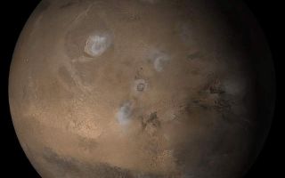 <h1>PIA07315:  Mars at Ls 160°: Tharsis</h1><div class="PIA07315" lang="en" style="width:640px;text-align:left;margin:auto;background-color:#000;padding:10px;max-height:150px;overflow:auto;"><p>This picture is a composite of Mars Global Surveyor (MGS) Mars Orbiter Camera (MOC) daily global images.acquired at Ls 160° during a previous Mars year. This month, Mars looks similar, as Ls 160° occurs in mid-February 2005. The picture shows the Tharsis face of Mars. Over the course of the month, additional faces of Mars as it appears at this time of year are being posted for MOC Picture of the Day. Ls, solar longitude, is a measure of the time of year on Mars. Mars travels 360° around the Sun in 1 Mars year. The year begins at Ls.0° -- the start of northern spring and southern summer. </p><p><b>Season:</b> Northern Summer/Southern Winter</p><br /><br /><a href="http://photojournal.jpl.nasa.gov/catalog/PIA07315" onclick="window.open(this.href); return false;" title="Voir l'image 	 PIA07315:  Mars at Ls 160°: Tharsis	  sur le site de la NASA">Voir l'image 	 PIA07315:  Mars at Ls 160°: Tharsis	  sur le site de la NASA.</a></div>