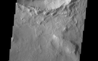<h1>PIA07442:  Central Peak in Elysium Planitia</h1><div class="PIA07442" lang="en" style="width:560px;text-align:left;margin:auto;background-color:#000;padding:10px;max-height:150px;overflow:auto;"><a href="/figures/PIA07442_fig1.jpg"></a><br /><p>The topic for the Image of the Day for the weeks of March 7-18 will be mountains on Mars.</p><p>This crater is located in Elysium Planitia and contains a well-preserved central peak, in contrast with the slumped crater walls. </p><p>A good diagram showing the structural difference between simple and complex craters is here: <a href="http://www.lpi.usra.edu/expmoon/science/craterstructure.html">http://www.lpi.usra.edu/expmoon/science/craterstructure.html</a></p>Image information: VIS instrument. Latitude 5.9, Longitude 129.8 East (230.2 West). 19 meter/pixel resolution.</p><p>Note: this THEMIS visual image has not been radiometrically nor geometrically calibrated for this preliminary release. An empirical correction has been performed to remove instrumental effects. A linear shift has been applied in the cross-track and down-track direction to approximate spacecraft and planetary motion. Fully calibrated and geometrically projected images will be released through the Planetary Data System in accordance with Project policies at a later time.</p><p>NASA's Jet Propulsion Laboratory manages the 2001 Mars Odyssey mission for NASA's Office of Space Science, Washington, D.C. The Thermal Emission Imaging System (THEMIS) was developed by Arizona State University, Tempe, in collaboration with Raytheon Santa Barbara Remote Sensing. The THEMIS investigation is led by Dr. Philip Christensen at Arizona State University. Lockheed Martin Astronautics, Denver, is the prime contractor for the Odyssey project, and developed and built the orbiter. Mission operations are conducted jointly from Lockheed Martin and from JPL, a division of the California Institute of Technology in Pasadena.</p><br /><br /><a href="http://photojournal.jpl.nasa.gov/catalog/PIA07442" onclick="window.open(this.href); return false;" title="Voir l'image 	 PIA07442:  Central Peak in Elysium Planitia	  sur le site de la NASA">Voir l'image 	 PIA07442:  Central Peak in Elysium Planitia	  sur le site de la NASA.</a></div>
