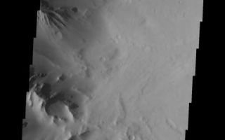 <h1>PIA07496:  Fractures in Tharsis Tholus</h1><div class="PIA07496" lang="en" style="width:539px;text-align:left;margin:auto;background-color:#000;padding:10px;max-height:150px;overflow:auto;"><a href="/figures/PIA07496_fig1.jpg"></a><br /><p>In the upper left corner of this VIS image are a series of fractures. Where the fractures are exposed on the surface it is impossible to tell the plane of the fracture; however where the fractures are visible in the cliff wall it is possible to see that the fractures dip to the north. This image shows part of the caldera of Tharsis Tholus. </p><p>Image information: VIS instrument. Latitude 13.5, Longitude 268.9 East (91.1 West). 19 meter/pixel resolution.</p><p>Note: this THEMIS visual image has not been radiometrically nor geometrically calibrated for this preliminary release. An empirical correction has been performed to remove instrumental effects. A linear shift has been applied in the cross-track and down-track direction to approximate spacecraft and planetary motion. Fully calibrated and geometrically projected images will be released through the Planetary Data System in accordance with Project policies at a later time.</p><p>NASA's Jet Propulsion Laboratory manages the 2001 Mars Odyssey mission for NASA's Office of Space Science, Washington, D.C. The Thermal Emission Imaging System (THEMIS) was developed by Arizona State University, Tempe, in collaboration with Raytheon Santa Barbara Remote Sensing. The THEMIS investigation is led by Dr. Philip Christensen at Arizona State University. Lockheed Martin Astronautics, Denver, is the prime contractor for the Odyssey project, and developed and built the orbiter. Mission operations are conducted jointly from Lockheed Martin and from JPL, a division of the California Institute of Technology in Pasadena.</p><br /><br /><a href="http://photojournal.jpl.nasa.gov/catalog/PIA07496" onclick="window.open(this.href); return false;" title="Voir l'image 	 PIA07496:  Fractures in Tharsis Tholus	  sur le site de la NASA">Voir l'image 	 PIA07496:  Fractures in Tharsis Tholus	  sur le site de la NASA.</a></div>
