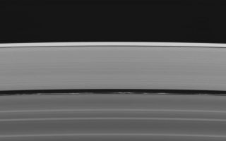 <h1>PIA07595:  Clumps for Encke</h1><div class="PIA07595" lang="en" style="width:800px;text-align:left;margin:auto;background-color:#000;padding:10px;max-height:150px;overflow:auto;"><p>Squinting at this view of Saturn's rings reveals not one but two of the four narrow ringlets in the Encke Gap (325 kilometers, or 200 miles, wide). The innermost of the two ringlets is much brighter and full of clumps.</p><p>The complicated and dynamic features in the Encke Gap are extensively influenced by the presence of Pan (26 kilometers, or 16 miles, across), which orbits in the center of the gap. The Encke Gap may contain other small moonlets, which imaging team members hope to discover in the future.</p><p>The image was taken in visible light with the Cassini spacecraft wide-angle camera on Aug. 20, 2005, at a distance of approximately 273,000 kilometers (170,000 miles) from Saturn. The image scale is 13 kilometers (8 miles) per pixel. </p><p>The Cassini-Huygens mission is a cooperative project of NASA, the European Space Agency and the Italian Space Agency. The Jet Propulsion Laboratory, a division of the California Institute of Technology in Pasadena, manages the mission for NASA's Science Mission Directorate, Washington, D.C. The Cassini orbiter and its two onboard cameras were designed, developed and assembled at JPL. The imaging operations center is based at the Space Science Institute in Boulder, Colo.</p><p>For more information about the Cassini-Huygens mission visit <a href="http://saturn.jpl.nasa.gov">http://saturn.jpl.nasa.gov</a>. For additional images visit the Cassini imaging team homepage <a href="http://ciclops.org">http://ciclops.org</a>.</p><br /><br /><a href="http://photojournal.jpl.nasa.gov/catalog/PIA07595" onclick="window.open(this.href); return false;" title="Voir l'image 	 PIA07595:  Clumps for Encke	  sur le site de la NASA">Voir l'image 	 PIA07595:  Clumps for Encke	  sur le site de la NASA.</a></div>