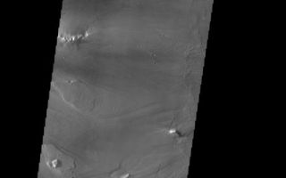 <h1>PIA07867:  Kasei Vallis Mosaic</h1><div class="PIA07867" lang="en" style="width:462px;text-align:left;margin:auto;background-color:#000;padding:10px;max-height:150px;overflow:auto;"><a href="/figures/PIA07867_fig1.jpg"></a><br /><p>Kasei Vallis is our topic for the weeks of April 18 and 25. Originating on the margin of Lunae Planum, the Kasei Vallis complex contains two main channels that run east-west across Tempe Terra and empty into Chryse Planitia. During the week of April 18th we will concentrate on the northern branch of Kasei Vallis. The week of April 25 will be devoted to the southern branch.</p><p>The formation of Kasei Vallis is still being studied and several theories exist. It is thought that volcanic subsurfaceing heating in the Tharsis/Lunae Planum region resulted in a release of water, which carved the channels and produced the landforms seen within the channels. One theory is that this was a one-time catastropic event, another theory speculates that several flooding events occurred over a long time period. Others have proposed that some of the landforms (especially scour marks and teardropshaped "islands") are the result of glacial flow rather than liquid flow. Teardrop shaped islands are common in terrestrial rivers, where the water is eroding material in the channel. A glacial feature called a <a href="http://www.zephryus.demon.co.uk/geography/resources/glaciers/drum.html">drumlin</a> has the exact sameshape, but is formed by deposition beneath continental glaciers.</p><p>This three-image mosaic illustrates the variety of features and textures within Kasei Vallis. </p><p>Image information: VIS instrument. Latitude 24.5, Longitude 297.5 East (62.5 West). 19 meter/pixel resolution.</p><p>Note: this THEMIS visual image has not been radiometrically nor geometrically calibrated for this preliminary release. An empirical correction has been performed to remove instrumental effects. A linear shift has been applied in the cross-track and down-track direction to approximate spacecraft and planetary motion. Fully calibrated and geometrically projected images will be released through the Planetary Data System in accordance with Project policies at a later time.</p><p>NASA's Jet Propulsion Laboratory manages the 2001 Mars Odyssey mission for NASA's Office of Space Science, Washington, D.C. The Thermal Emission Imaging System (THEMIS) was developed by Arizona State University, Tempe, in collaboration with Raytheon Santa Barbara Remote Sensing. The THEMIS investigation is led by Dr. Philip Christensen at Arizona State University. Lockheed Martin Astronautics, Denver, is the prime contractor for the Odyssey project, and developed and built the orbiter. Mission operations are conducted jointly from Lockheed Martin and from JPL, a division of the California Institute of Technology in Pasadena.</p><br /><br /><a href="http://photojournal.jpl.nasa.gov/catalog/PIA07867" onclick="window.open(this.href); return false;" title="Voir l'image 	 PIA07867:  Kasei Vallis Mosaic	  sur le site de la NASA">Voir l'image 	 PIA07867:  Kasei Vallis Mosaic	  sur le site de la NASA.</a></div>