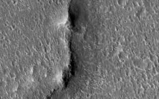 <h1>PIA07885:  Cratered Isidis Plain</h1><div class="PIA07885" lang="en" style="width:379px;text-align:left;margin:auto;background-color:#000;padding:10px;max-height:150px;overflow:auto;"><p>25 April 2005<br />This Mars Global Surveyor (MGS) Mars Orbiter Camera (MOC) image shows terrain in eastern Isidis Planitia that is very heavily peppered with impact craters of diameters of a few hundred meters (a few hundred yards) or less. One aim of the MGS MOC Picture of the Day series is to showcase the rich variety of martian surfaces; this one should be compared with other Pictures of the Day in recent weeks, as most of these are shown covering an area of about the same width, approximately 3 kilometers (1.9 miles).</p><p>Location near: 17.5°N, 263.1°W <br />Image width: ~3 km (~1.9 mi) <br />Illumination from: lower left <br />Season: Northern Summer <br /></p><br /><br /><a href="http://photojournal.jpl.nasa.gov/catalog/PIA07885" onclick="window.open(this.href); return false;" title="Voir l'image 	 PIA07885:  Cratered Isidis Plain	  sur le site de la NASA">Voir l'image 	 PIA07885:  Cratered Isidis Plain	  sur le site de la NASA.</a></div>