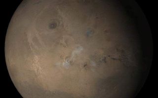 <h1>PIA07893:  Mars at Ls 211°: Tharsis</h1><div class="PIA07893" lang="en" style="width:640px;text-align:left;margin:auto;background-color:#000;padding:10px;max-height:150px;overflow:auto;"><p>3 May 2005<br />This picture is a composite of Mars Global Surveyor (MGS) Mars Orbiter Camera (MOC) daily global images acquired at Ls 211° during a previous Mars year. This month, Mars looks similar, as Ls 211° occurs in mid-May 2005. The picture shows the Tharsis face of Mars. Over the course of the month, additional faces of Mars as it appears at this time of year are being posted for MOC Picture of the Day. Ls, solar longitude, is a measure of the time of year on Mars. Mars travels 360° around the Sun in 1 Mars year. The year begins at Ls 0°, the start of northern spring and southern autumn.</p><p>Season: Northern Autumn/Southern Spring <br /><br /><br /><a href="http://photojournal.jpl.nasa.gov/catalog/PIA07893" onclick="window.open(this.href); return false;" title="Voir l'image 	 PIA07893:  Mars at Ls 211°: Tharsis	  sur le site de la NASA">Voir l'image 	 PIA07893:  Mars at Ls 211°: Tharsis	  sur le site de la NASA.</a></div>