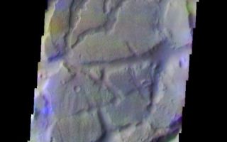 <h1>PIA07932:  Aureum Chaos: Another View</h1><div class="PIA07932" lang="en" style="width:517px;text-align:left;margin:auto;background-color:#000;padding:10px;max-height:150px;overflow:auto;"><a href="/figures/PIA07932_fig1.jpg"></a><br /><p>The THEMIS VIS camera is capable of capturing color images of the Martian surface using five different color filters. In this mode of operation, the spatial resolution and coverage of the image must be reduced to accommodate the additional data volume produced from using multiple filters. To make a color image, three of the five filter images (each in grayscale) are selected. Each is contrast enhanced and then converted to a red, green, or blue intensity image. These three images are then combined to produce a full color, single image. Because the THEMIS color filters don't span the full range of colors seen by the human eye, a color THEMIS image does not represent true color. Also, because each single-filter image is contrast enhanced before inclusion in the three-color image, the apparent color variation of the scene is exaggerated. Nevertheless, the color variation that does appear is representative of some change in color, however subtle, in the actual scene. Note that the long edges of THEMIS color images typically contain color artifacts that do not represent surface variation.</p><p>This false color image is located in a different part of Aureum Chaos. Compare the surface textures with yesterday's image. This image was collected during the Southern Fall season.</p><p>Image information: VIS instrument. Latitude -4.1, Longitude 333.9 East (26.1 West). 35 meter/pixel resolution.</p><p>Note: this THEMIS visual image has not been radiometrically nor geometrically calibrated for this preliminary release. An empirical correction has been performed to remove instrumental effects. A linear shift has been applied in the cross-track and down-track direction to approximate spacecraft and planetary motion. Fully calibrated and geometrically projected images will be released through the Planetary Data System in accordance with Project policies at a later time.</p><p>NASA's Jet Propulsion Laboratory manages the 2001 Mars Odyssey mission for NASA's Office of Space Science, Washington, D.C. The Thermal Emission Imaging System (THEMIS) was developed by Arizona State University, Tempe, in collaboration with Raytheon Santa Barbara Remote Sensing. The THEMIS investigation is led by Dr. Philip Christensen at Arizona State University. Lockheed Martin Astronautics, Denver, is the prime contractor for the Odyssey project, and developed and built the orbiter. Mission operations are conducted jointly from Lockheed Martin and from JPL, a division of the California Institute of Technology in Pasadena.</p><br /><br /><a href="http://photojournal.jpl.nasa.gov/catalog/PIA07932" onclick="window.open(this.href); return false;" title="Voir l'image 	 PIA07932:  Aureum Chaos: Another View	  sur le site de la NASA">Voir l'image 	 PIA07932:  Aureum Chaos: Another View	  sur le site de la NASA.</a></div>