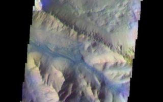 <h1>PIA07933:  Coprates Chasma</h1><div class="PIA07933" lang="en" style="width:514px;text-align:left;margin:auto;background-color:#000;padding:10px;max-height:150px;overflow:auto;"><a href="/figures/PIA07933_fig1.jpg"></a><br /><p>The THEMIS VIS camera is capable of capturing color images of the Martian surface using five different color filters. In this mode of operation, the spatial resolution and coverage of the image must be reduced to accommodate the additional data volume produced from using multiple filters. To make a color image, three of the five filter images (each in grayscale) are selected. Each is contrast enhanced and then converted to a red, green, or blue intensity image. These three images are then combined to produce a full color, single image. Because the THEMIS color filters don't span the full range of colors seen by the human eye, a color THEMIS image does not represent true color. Also, because each single-filter image is contrast enhanced before inclusion in the three-color image, the apparent color variation of the scene is exaggerated. Nevertheless, the color variation that does appear is representative of some change in color, however subtle, in the actual scene. Note that the long edges of THEMIS color images typically contain color artifacts that do not represent surface variation.</p><p>This false color image shows part of the central ridge in Coprates Chasma, a portion of Valles Marineris. This image was collected during the Southern Fall season.</p><p>Image information: VIS instrument. Latitude -12.6, Longitude 294.7 East (65.3 West). 35 meter/pixel resolution.</p><p>Note: this THEMIS visual image has not been radiometrically nor geometrically calibrated for this preliminary release. An empirical correction has been performed to remove instrumental effects. A linear shift has been applied in the cross-track and down-track direction to approximate spacecraft and planetary motion. Fully calibrated and geometrically projected images will be released through the Planetary Data System in accordance with Project policies at a later time.</p><p>NASA's Jet Propulsion Laboratory manages the 2001 Mars Odyssey mission for NASA's Office of Space Science, Washington, D.C. The Thermal Emission Imaging System (THEMIS) was developed by Arizona State University, Tempe, in collaboration with Raytheon Santa Barbara Remote Sensing. The THEMIS investigation is led by Dr. Philip Christensen at Arizona State University. Lockheed Martin Astronautics, Denver, is the prime contractor for the Odyssey project, and developed and built the orbiter. Mission operations are conducted jointly from Lockheed Martin and from JPL, a division of the California Institute of Technology in Pasadena.</p><br /><br /><a href="http://photojournal.jpl.nasa.gov/catalog/PIA07933" onclick="window.open(this.href); return false;" title="Voir l'image 	 PIA07933:  Coprates Chasma	  sur le site de la NASA">Voir l'image 	 PIA07933:  Coprates Chasma	  sur le site de la NASA.</a></div>