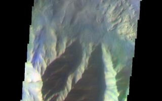 <h1>PIA07952:  Hebes Chasma Wall</h1><div class="PIA07952" lang="en" style="width:516px;text-align:left;margin:auto;background-color:#000;padding:10px;max-height:150px;overflow:auto;"><a href="/figures/PIA07952_fig1.jpg"></a><br /><p>The THEMIS VIS camera is capable of capturing color images of the Martian surface using five different color filters. In this mode of operation, the spatial resolution and coverage of the image must be reduced to accommodate the additional data volume produced from using multiple filters. To make a color image, three of the five filter images (each in grayscale) are selected. Each is contrast enhanced and then converted to a red, green, or blue intensity image. These three images are then combined to produce a full color, single image. Because the THEMIS color filters don't span the full range of colors seen by the human eye, a color THEMIS image does not represent true color. Also, because each single-filter image is contrast enhanced before inclusion in the three-color image, the apparent color variation of the scene is exaggerated. Nevertheless, the color variation that does appear is representative of some change in color, however subtle, in the actual scene. Note that the long edges of THEMIS color images typically contain color artifacts that do not represent surface variation.</p><p>This false color image of a canyon wall located in Hebes Chasma, was collected during the Southern Fall season. Hebes Chasma is located north of Valles Marineris.</p><p>Image information: VIS instrument. Latitude -1.5, Longitude 284.5 East (75.5 West). 35 meter/pixel resolution.</p><p>Note: this THEMIS visual image has not been radiometrically nor geometrically calibrated for this preliminary release. An empirical correction has been performed to remove instrumental effects. A linear shift has been applied in the cross-track and down-track direction to approximate spacecraft and planetary motion. Fully calibrated and geometrically projected images will be released through the Planetary Data System in accordance with Project policies at a later time.</p><p>NASA's Jet Propulsion Laboratory manages the 2001 Mars Odyssey mission for NASA's Office of Space Science, Washington, D.C. The Thermal Emission Imaging System (THEMIS) was developed by Arizona State University, Tempe, in collaboration with Raytheon Santa Barbara Remote Sensing. The THEMIS investigation is led by Dr. Philip Christensen at Arizona State University. Lockheed Martin Astronautics, Denver, is the prime contractor for the Odyssey project, and developed and built the orbiter. Mission operations are conducted jointly from Lockheed Martin and from JPL, a division of the California Institute of Technology in Pasadena.</p><br /><br /><a href="http://photojournal.jpl.nasa.gov/catalog/PIA07952" onclick="window.open(this.href); return false;" title="Voir l'image 	 PIA07952:  Hebes Chasma Wall	  sur le site de la NASA">Voir l'image 	 PIA07952:  Hebes Chasma Wall	  sur le site de la NASA.</a></div>