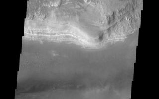 <h1>PIA08033:  Layered Deposit</h1><div class="PIA08033" lang="en" style="width:551px;text-align:left;margin:auto;background-color:#000;padding:10px;max-height:150px;overflow:auto;"><p><a href="/figures/PIA08033_fig1.jpg"></a><br><b>Context image for PIA08033<br />Layered Deposit</b></p><p>This image shows a small portion of the layered deposits found in Melas Chasma.<p>Image information: VIS instrument. Latitude -13.1N, Longitude 289.3E. 17 meter/pixel resolution.</p><p>Please see the <a href="http://themis.asu.edu/terms" target="_blank">THEMIS Data Citation Note</a> for details on crediting THEMIS images. </p><p>Note: this THEMIS visual image has not been radiometrically nor geometrically calibrated for this preliminary release. An empirical correction has been performed to remove instrumental effects. A linear shift has been applied in the cross-track and down-track direction to approximate spacecraft and planetary motion. Fully calibrated and geometrically projected images will be released through the Planetary Data System in accordance with Project policies at a later time.</p><p>NASA's Jet Propulsion Laboratory manages the 2001 Mars Odyssey mission for NASA's Office of Space Science, Washington, D.C. The Thermal Emission Imaging System (THEMIS) was developed by Arizona State University, Tempe, in collaboration with Raytheon Santa Barbara Remote Sensing. The THEMIS investigation is led by Dr. Philip Christensen at Arizona State University. Lockheed Martin Astronautics, Denver, is the prime contractor for the Odyssey project, and developed and built the orbiter. Mission operations are conducted jointly from Lockheed Martin and from JPL, a division of the California Institute of Technology in Pasadena.</p><br /><br /><a href="http://photojournal.jpl.nasa.gov/catalog/PIA08033" onclick="window.open(this.href); return false;" title="Voir l'image 	 PIA08033:  Layered Deposit	  sur le site de la NASA">Voir l'image 	 PIA08033:  Layered Deposit	  sur le site de la NASA.</a></div>