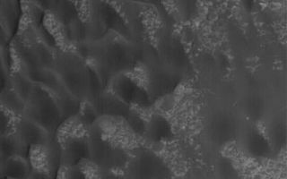 <h1>PIA08056:  Tyrrhena Dunes</h1><div class="PIA08056" lang="en" style="width:404px;text-align:left;margin:auto;background-color:#000;padding:10px;max-height:150px;overflow:auto;"><p>8 April 2006<br />This Mars Global Surveyor (MGS) Mars Orbiter Camera (MOC) image shows a portion of a field of dark sand dunes superposed on the light-toned floor of a crater in eastern Tyrrhena Terra. The orientation of the dunes -- with the steep faces toward the south (bottom) -- suggests that winds generally blew from north to south at the time the dunes were formed.</p><p>Location near: 14.6°S, 262.3°W <br />Image width: ~3 km (~1.9 mi) <br />Illumination from: lower left <br />Season: Southern Summer </p><br /><br /><a href="http://photojournal.jpl.nasa.gov/catalog/PIA08056" onclick="window.open(this.href); return false;" title="Voir l'image 	 PIA08056:  Tyrrhena Dunes	  sur le site de la NASA">Voir l'image 	 PIA08056:  Tyrrhena Dunes	  sur le site de la NASA.</a></div>