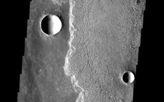 <h1>PIA08071:  Arsia Mons Lava</h1><div class="PIA08071" lang="en" style="width:551px;text-align:left;margin:auto;background-color:#000;padding:10px;max-height:150px;overflow:auto;"><p><a href="/figures/PIA08071_fig1.jpg"></a><br><b>Context image for PIA08071<br />Arsia Mons Lava</b></p><p>These rough surfaced lava flows originated at Arsia Mons.<p>Image information: VIS instrument. Latitude -19.2N, Longitude 244.7E. 17 meter/pixel resolution.</p><p>Please see the <a href="http://themis.asu.edu/terms" target="_blank">THEMIS Data Citation Note</a> for details on crediting THEMIS images. </p><p>Note: this THEMIS visual image has not been radiometrically nor geometrically calibrated for this preliminary release. An empirical correction has been performed to remove instrumental effects. A linear shift has been applied in the cross-track and down-track direction to approximate spacecraft and planetary motion. Fully calibrated and geometrically projected images will be released through the Planetary Data System in accordance with Project policies at a later time.</p><p>NASA's Jet Propulsion Laboratory manages the 2001 Mars Odyssey mission for NASA's Office of Space Science, Washington, D.C. The Thermal Emission Imaging System (THEMIS) was developed by Arizona State University, Tempe, in collaboration with Raytheon Santa Barbara Remote Sensing. The THEMIS investigation is led by Dr. Philip Christensen at Arizona State University. Lockheed Martin Astronautics, Denver, is the prime contractor for the Odyssey project, and developed and built the orbiter. Mission operations are conducted jointly from Lockheed Martin and from JPL, a division of the California Institute of Technology in Pasadena.</p><br /><br /><a href="http://photojournal.jpl.nasa.gov/catalog/PIA08071" onclick="window.open(this.href); return false;" title="Voir l'image 	 PIA08071:  Arsia Mons Lava	  sur le site de la NASA">Voir l'image 	 PIA08071:  Arsia Mons Lava	  sur le site de la NASA.</a></div>