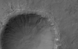 <h1>PIA08078:  Gullied Crater</h1><div class="PIA08078" lang="en" style="width:800px;text-align:left;margin:auto;background-color:#000;padding:10px;max-height:150px;overflow:auto;"><p>17 April 2006<br />This Mars Global Surveyor (MGS) Mars Orbiter Camera (MOC) image shows a 1.5 meters (~5 feet) per pixel view of a crater in the Terra Cimmeria region of Mars. Several gullies extend from near the top of the crater rim, downslope toward the floor of the crater. Liquid water might have played a role in their genesis.</p><p>Location near: 37.7°S, 191.6°W <br />Image width: ~3 km (~1.9 mi) <br />Illumination from: upper left <br />Season: Southern Summer </p><br /><br /><a href="http://photojournal.jpl.nasa.gov/catalog/PIA08078" onclick="window.open(this.href); return false;" title="Voir l'image 	 PIA08078:  Gullied Crater	  sur le site de la NASA">Voir l'image 	 PIA08078:  Gullied Crater	  sur le site de la NASA.</a></div>