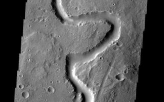 <h1>PIA08086:  Winding Channel</h1><div class="PIA08086" lang="en" style="width:582px;text-align:left;margin:auto;background-color:#000;padding:10px;max-height:150px;overflow:auto;"><p><a href="/figures/PIA08086_fig1.jpg"></a><br><b>Context image for PIA08086<br />Winding Channel</b></p><p>This small, unnamed channel is located in Arabia Terra.<p>Image information: VIS instrument. Latitude 28.7N, Longitude 349.6E. 19 meter/pixel resolution.</p><p>Please see the <a href="http://themis.asu.edu/terms" target="_blank">THEMIS Data Citation Note</a> for details on crediting THEMIS images. </p><p>Note: this THEMIS visual image has not been radiometrically nor geometrically calibrated for this preliminary release. An empirical correction has been performed to remove instrumental effects. A linear shift has been applied in the cross-track and down-track direction to approximate spacecraft and planetary motion. Fully calibrated and geometrically projected images will be released through the Planetary Data System in accordance with Project policies at a later time.</p><p>NASA's Jet Propulsion Laboratory manages the 2001 Mars Odyssey mission for NASA's Office of Space Science, Washington, D.C. The Thermal Emission Imaging System (THEMIS) was developed by Arizona State University, Tempe, in collaboration with Raytheon Santa Barbara Remote Sensing. The THEMIS investigation is led by Dr. Philip Christensen at Arizona State University. Lockheed Martin Astronautics, Denver, is the prime contractor for the Odyssey project, and developed and built the orbiter. Mission operations are conducted jointly from Lockheed Martin and from JPL, a division of the California Institute of Technology in Pasadena.</p><br /><br /><a href="http://photojournal.jpl.nasa.gov/catalog/PIA08086" onclick="window.open(this.href); return false;" title="Voir l'image 	 PIA08086:  Winding Channel	  sur le site de la NASA">Voir l'image 	 PIA08086:  Winding Channel	  sur le site de la NASA.</a></div>