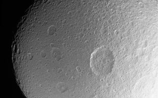 <h1>PIA08149:  Penelope Crater</h1><div class="PIA08149" lang="en" style="width:800px;text-align:left;margin:auto;background-color:#000;padding:10px;max-height:150px;overflow:auto;"><p>This dramatic close-up of Tethys shows the large crater Penelope lying near center, overprinted by many smaller, younger impact sites. </p><p>Three smaller impact features of roughly similar size make a line left of Penelope that runs north-south: (from bottom) Ajax, Polyphemus and Phemius.</p><p>Features on Tethys are named for characters and places from "The Iliad" and "The Odyssey." The largest impact structure on Tethys is named Odysseus. (See <a href="/catalog/PIA07693">PIA07693</a> for a stunning close-up of Odysseus.)</p><p>The view is toward the Saturn-facing hemisphere on Tethys (1,071 kilometers, or 665 miles across). North is up.</p><p>The image was taken in polarized ultraviolet light with the Cassini spacecraft narrow-angle camera on Feb. 25, 2006 at a distance of approximately 165,000 kilometers (103,000 miles) from Tethys and at a Sun-Tethys-spacecraft, or phase, angle of 23 degrees. Image scale is 984 meters (3,227 feet) per pixel.</p><p>The Cassini-Huygens mission is a cooperative project of NASA, the European Space Agency and the Italian Space Agency. The Jet Propulsion Laboratory, a division of the California Institute of Technology in Pasadena, manages the mission for NASA's Science Mission Directorate, Washington, D.C. The Cassini orbiter and its two onboard cameras were designed, developed and assembled at JPL. The imaging operations center is based at the Space Science Institute in Boulder, Colo.</p><p>For more information about the Cassini-Huygens mission visit <a href="http://saturn.jpl.nasa.gov">http://saturn.jpl.nasa.gov/home/index.cfm</a>. The Cassini imaging team homepage is at <a href="http://ciclops.org">http://ciclops.org</a>.</p><br /><br /><a href="http://photojournal.jpl.nasa.gov/catalog/PIA08149" onclick="window.open(this.href); return false;" title="Voir l'image 	 PIA08149:  Penelope Crater	  sur le site de la NASA">Voir l'image 	 PIA08149:  Penelope Crater	  sur le site de la NASA.</a></div>