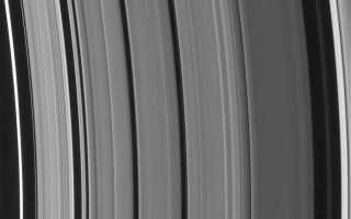 <h1>PIA08330:  New Rings for Cassini's Division</h1><div class="PIA08330" lang="en" style="width:800px;text-align:left;margin:auto;background-color:#000;padding:10px;max-height:150px;overflow:auto;"><p><a href="/figures/PIA08330_fig1.jpg"></a><br />Figure 1</p><p>High-resolution Cassini images show an astonishing level of structure in Saturn's Cassini Division, including two ringlets that were not seen in NASA Voyager spacecraft images 25 years ago. </p><p>This image shows a new ringlet at right, just interior to the bright outer edge of the Cassini Division. This diffuse structure is about 50 kilometers (31 miles) wide. </p><p>The second new ringlet is roughly at center in this view. It is a very narrow feature, about 6 kilometers (4 miles) wide, between the familiar broad bands of material in the Cassini Division, and displays a great deal of variation in brightness along its length. (We include here an annotated version of this image indicating the new rings.)</p><p>This image was taken in visible light with the Cassini spacecraft narrow-angle camera on Sept. 9, 2006, at a distance of approximately 414,000 kilometers (257,000 miles) from Saturn. This view looks toward the lit side of the rings from about 17 degrees below the ringplane. The phase angle, or sun-Saturn-spacecraft angle, was 96 degrees. Image scale on the sky at the distance of Saturn is 2 kilometers (1 mile) per pixel.</p><p>The Cassini-Huygens mission is a cooperative project of NASA, the European Space Agency and the Italian Space Agency. The Jet Propulsion Laboratory, a division of the California Institute of Technology in Pasadena, manages the mission for NASA's Science Mission Directorate, Washington, D.C. The Cassini orbiter and its two onboard cameras were designed, developed and assembled at JPL. The imaging operations center is based at the Space Science Institute in Boulder, Colo.</p><p>For more information about the Cassini-Huygens mission visit <a href="http://saturn.jpl.nasa.gov">http://saturn.jpl.nasa.gov/home/index.cfm</a>. The Cassini imaging team homepage is at <a href="http://ciclops.org">http://ciclops.org</a>.</p><br /><br /><a href="http://photojournal.jpl.nasa.gov/catalog/PIA08330" onclick="window.open(this.href); return false;" title="Voir l'image 	 PIA08330:  New Rings for Cassini's Division	  sur le site de la NASA">Voir l'image 	 PIA08330:  New Rings for Cassini's Division	  sur le site de la NASA.</a></div>