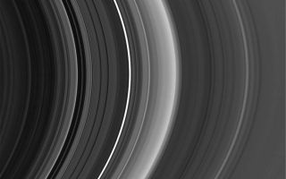 <h1>PIA08331:  New Rings for Cassini's Division</h1><div class="PIA08331" lang="en" style="width:800px;text-align:left;margin:auto;background-color:#000;padding:10px;max-height:150px;overflow:auto;"><p><a href="/figures/PIA08331_fig1.jpg"></a><br />Figure 1</p><p>High-resolution Cassini images show an astonishing level of structure in Saturn's Cassini Division, including two ringlets that were not seen in NASA Voyager spacecraft images 25 years ago. </p><p>This view was taken with the sun almost directly behind Saturn and its rings, a viewing geometry in which microscopic ring particles brighten substantially. The image shows the diffuse new ringlet in the Cassini Division as the brightest feature in that region.</p><p>This image was taken in visible light with the Cassini spacecraft narrow-angle camera on Sept. 15, 2006, at a distance of approximately 2.2 million kilometers (1.4 million miles) from Saturn. This view looks toward the unlit side of the rings from about 15 degrees above the ringplane. The phase angle, or sun-Saturn-spacecraft angle, was 179 degrees. Image scale on the sky at the distance of Saturn is 13 kilometers (8 miles) per pixel.</p><p>The Cassini-Huygens mission is a cooperative project of NASA, the European Space Agency and the Italian Space Agency. The Jet Propulsion Laboratory, a division of the California Institute of Technology in Pasadena, manages the mission for NASA's Science Mission Directorate, Washington, D.C. The Cassini orbiter and its two onboard cameras were designed, developed and assembled at JPL. The imaging operations center is based at the Space Science Institute in Boulder, Colo.</p><p>For more information about the Cassini-Huygens mission visit <a href="http://saturn.jpl.nasa.gov">http://saturn.jpl.nasa.gov/home/index.cfm</a>. The Cassini imaging team homepage is at <a href="http://ciclops.org">http://ciclops.org</a>.</p><br /><br /><a href="http://photojournal.jpl.nasa.gov/catalog/PIA08331" onclick="window.open(this.href); return false;" title="Voir l'image 	 PIA08331:  New Rings for Cassini's Division	  sur le site de la NASA">Voir l'image 	 PIA08331:  New Rings for Cassini's Division	  sur le site de la NASA.</a></div>