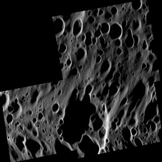 <h1>PIA08377:  A Scene of Craters</h1><div class="PIA08377" lang="en" style="width:800px;text-align:left;margin:auto;background-color:#000;padding:10px;max-height:150px;overflow:auto;"><p>This high-resolution view shows a vast range of crater sizes in the dark terrain of the leading hemisphere of Saturn's moon Iapetus.</p><p>Across the scene, a few small bright spots indicate fresh, rayed craters where impactors have punched through the thin blanket of dark material to the cleaner ice beneath.</p><p>The slight elevation on the bottom half of the image is part of the giant equatorial ridge that spans a wide fraction of Iapetus' circumference. The numerous craters on top of the ridge indicate that it is an old surface feature. </p><p>The mosaic consists of three image footprints across the surface of Iapetus. The view is centered on terrain near 0.5 degrees north latitude, 141.6 degrees west longitude. Image scale is approximately 22 meters (72 feet) per pixel. Illumination is from the left.</p><p>The clear spectral filter images in this mosaic were obtained with the Cassini spacecraft narrow-angle camera on Sept. 10, 2007, at a distance of approximately 63,000 kilometers (39,000 miles) from Iapetus and at a sun-Iapetus-spacecraft, or phase, angle of about 125 degrees.</p><p>Iapetus is 1,468 kilometers (912 miles) across.</p><p>The Cassini-Huygens mission is a cooperative project of NASA, the European Space Agency and the Italian Space Agency. The Jet Propulsion Laboratory, a division of the California Institute of Technology in Pasadena, manages the mission for NASA's Science Mission Directorate, Washington, D.C. The Cassini orbiter and its two onboard cameras were designed, developed and assembled at JPL. The imaging operations center is based at the Space Science Institute in Boulder, Colo.</p><p>For more information about the Cassini-Huygens mission visit <a href="http://saturn.jpl.nasa.gov">http://saturn.jpl.nasa.gov/home/index.cfm</a>. The Cassini imaging team homepage is at <a href="http://ciclops.org">http://ciclops.org</a>.</p><br /><br /><a href="http://photojournal.jpl.nasa.gov/catalog/PIA08377" onclick="window.open(this.href); return false;" title="Voir l'image 	 PIA08377:  A Scene of Craters	  sur le site de la NASA">Voir l'image 	 PIA08377:  A Scene of Craters	  sur le site de la NASA.</a></div>