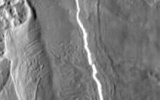 <h1>PIA08420:  Lava Flow</h1><div class="PIA08420" lang="en" style="width:212px;text-align:left;margin:auto;background-color:#000;padding:10px;max-height:150px;overflow:auto;"><p><a href="/figures/PIA08420_fig1.jpg"></a><br><b>Context image for PIA08420<br />Lava Flow</b></p><p>This vent and associated flow are located at the base of Arsia Mons.<p>Image information: IR instrument. Latitude -6.8N, Longitude 236.2E. 98 meter/pixel resolution.</p><p>Please see the <a href="http://themis.asu.edu/terms" target="_blank">THEMIS Data Citation Note</a> for details on crediting THEMIS images. </p><p>Note: this THEMIS visual image has not been radiometrically nor geometrically calibrated for this preliminary release. An empirical correction has been performed to remove instrumental effects. A linear shift has been applied in the cross-track and down-track direction to approximate spacecraft and planetary motion. Fully calibrated and geometrically projected images will be released through the Planetary Data System in accordance with Project policies at a later time.</p><p>NASA's Jet Propulsion Laboratory manages the 2001 Mars Odyssey mission for NASA's Office of Space Science, Washington, D.C. The Thermal Emission Imaging System (THEMIS) was developed by Arizona State University, Tempe, in collaboration with Raytheon Santa Barbara Remote Sensing. The THEMIS investigation is led by Dr. Philip Christensen at Arizona State University. Lockheed Martin Astronautics, Denver, is the prime contractor for the Odyssey project, and developed and built the orbiter. Mission operations are conducted jointly from Lockheed Martin and from JPL, a division of the California Institute of Technology in Pasadena.</p><br /><br /><a href="http://photojournal.jpl.nasa.gov/catalog/PIA08420" onclick="window.open(this.href); return false;" title="Voir l'image 	 PIA08420:  Lava Flow	  sur le site de la NASA">Voir l'image 	 PIA08420:  Lava Flow	  sur le site de la NASA.</a></div>