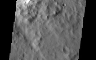<h1>PIA08421:  Dust Slides</h1><div class="PIA08421" lang="en" style="width:564px;text-align:left;margin:auto;background-color:#000;padding:10px;max-height:150px;overflow:auto;"><p><a href="/figures/PIA08421_fig1.jpg"></a><br><b>Context image for PIA08421<br />Dust Slides</b></p><p>These dark streaks show where dust has been moving down the rim of the unnamed crater.<p>Image information: VIS instrument. Latitude 8.6N, Longitude 40.1E. 18 meter/pixel resolution.</p><p>Please see the <a href="http://themis.asu.edu/terms" target="_blank">THEMIS Data Citation Note</a> for details on crediting THEMIS images. </p><p>Note: this THEMIS visual image has not been radiometrically nor geometrically calibrated for this preliminary release. An empirical correction has been performed to remove instrumental effects. A linear shift has been applied in the cross-track and down-track direction to approximate spacecraft and planetary motion. Fully calibrated and geometrically projected images will be released through the Planetary Data System in accordance with Project policies at a later time.</p><p>NASA's Jet Propulsion Laboratory manages the 2001 Mars Odyssey mission for NASA's Office of Space Science, Washington, D.C. The Thermal Emission Imaging System (THEMIS) was developed by Arizona State University, Tempe, in collaboration with Raytheon Santa Barbara Remote Sensing. The THEMIS investigation is led by Dr. Philip Christensen at Arizona State University. Lockheed Martin Astronautics, Denver, is the prime contractor for the Odyssey project, and developed and built the orbiter. Mission operations are conducted jointly from Lockheed Martin and from JPL, a division of the California Institute of Technology in Pasadena.</p><br /><br /><a href="http://photojournal.jpl.nasa.gov/catalog/PIA08421" onclick="window.open(this.href); return false;" title="Voir l'image 	 PIA08421:  Dust Slides	  sur le site de la NASA">Voir l'image 	 PIA08421:  Dust Slides	  sur le site de la NASA.</a></div>