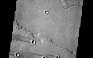<h1>PIA08422:  Windstreaks</h1><div class="PIA08422" lang="en" style="width:556px;text-align:left;margin:auto;background-color:#000;padding:10px;max-height:150px;overflow:auto;"><p><a href="/figures/PIA08422_fig1.jpg"></a><br><b>Context image for PIA08422<br />Windstreaks</b></p><p>This group of windstreaks is located on lava flows west of Arsia Mons.<p>Image information: VIS instrument. Latitude -11.0N, Longitude 219.5E. 18 meter/pixel resolution.</p><p>Please see the <a href="http://themis.asu.edu/terms" target="_blank">THEMIS Data Citation Note</a> for details on crediting THEMIS images. </p><p>Note: this THEMIS visual image has not been radiometrically nor geometrically calibrated for this preliminary release. An empirical correction has been performed to remove instrumental effects. A linear shift has been applied in the cross-track and down-track direction to approximate spacecraft and planetary motion. Fully calibrated and geometrically projected images will be released through the Planetary Data System in accordance with Project policies at a later time.</p><p>NASA's Jet Propulsion Laboratory manages the 2001 Mars Odyssey mission for NASA's Office of Space Science, Washington, D.C. The Thermal Emission Imaging System (THEMIS) was developed by Arizona State University, Tempe, in collaboration with Raytheon Santa Barbara Remote Sensing. The THEMIS investigation is led by Dr. Philip Christensen at Arizona State University. Lockheed Martin Astronautics, Denver, is the prime contractor for the Odyssey project, and developed and built the orbiter. Mission operations are conducted jointly from Lockheed Martin and from JPL, a division of the California Institute of Technology in Pasadena.</p><br /><br /><a href="http://photojournal.jpl.nasa.gov/catalog/PIA08422" onclick="window.open(this.href); return false;" title="Voir l'image 	 PIA08422:  Windstreaks	  sur le site de la NASA">Voir l'image 	 PIA08422:  Windstreaks	  sur le site de la NASA.</a></div>