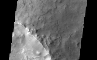 <h1>PIA08441:  Crater Slide</h1><div class="PIA08441" lang="en" style="width:560px;text-align:left;margin:auto;background-color:#000;padding:10px;max-height:150px;overflow:auto;"><p><a href="/figures/PIA08441_fig1.jpg"></a><br><b>Context image for PIA08441<br />Crater Slide</b></p><p>This landslide occurs in an unnamed crater.<p>Image information: VIS instrument. Latitude -7.4N, Longitude 76.8E. 18 meter/pixel resolution.</p><p>Please see the <a href="http://themis.asu.edu/terms" target="_blank">THEMIS Data Citation Note</a> for details on crediting THEMIS images. </p><p>Note: this THEMIS visual image has not been radiometrically nor geometrically calibrated for this preliminary release. An empirical correction has been performed to remove instrumental effects. A linear shift has been applied in the cross-track and down-track direction to approximate spacecraft and planetary motion. Fully calibrated and geometrically projected images will be released through the Planetary Data System in accordance with Project policies at a later time.</p><p>NASA's Jet Propulsion Laboratory manages the 2001 Mars Odyssey mission for NASA's Office of Space Science, Washington, D.C. The Thermal Emission Imaging System (THEMIS) was developed by Arizona State University, Tempe, in collaboration with Raytheon Santa Barbara Remote Sensing. The THEMIS investigation is led by Dr. Philip Christensen at Arizona State University. Lockheed Martin Astronautics, Denver, is the prime contractor for the Odyssey project, and developed and built the orbiter. Mission operations are conducted jointly from Lockheed Martin and from JPL, a division of the California Institute of Technology in Pasadena.</p><br /><br /><a href="http://photojournal.jpl.nasa.gov/catalog/PIA08441" onclick="window.open(this.href); return false;" title="Voir l'image 	 PIA08441:  Crater Slide	  sur le site de la NASA">Voir l'image 	 PIA08441:  Crater Slide	  sur le site de la NASA.</a></div>