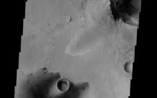<h1>PIA08473:  Dunes</h1><div class="PIA08473" lang="en" style="width:568px;text-align:left;margin:auto;background-color:#000;padding:10px;max-height:150px;overflow:auto;"><p><a href="/figures/PIA08473_fig1.jpg"></a><br><b>Context image for PIA08473<br />Dunes</b></p><p>These small dunes occur on the floor of an unnamed crater in Arabia Terra.<p>Image information: VIS instrument. Latitude 12.1N, Longitude 3.7E. 18 meter/pixel resolution.</p><p>Please see the <a href="http://themis.asu.edu/terms" target="_blank">THEMIS Data Citation Note</a> for details on crediting THEMIS images. </p><p>Note: this THEMIS visual image has not been radiometrically nor geometrically calibrated for this preliminary release. An empirical correction has been performed to remove instrumental effects. A linear shift has been applied in the cross-track and down-track direction to approximate spacecraft and planetary motion. Fully calibrated and geometrically projected images will be released through the Planetary Data System in accordance with Project policies at a later time.</p><p>NASA's Jet Propulsion Laboratory manages the 2001 Mars Odyssey mission for NASA's Office of Space Science, Washington, D.C. The Thermal Emission Imaging System (THEMIS) was developed by Arizona State University, Tempe, in collaboration with Raytheon Santa Barbara Remote Sensing. The THEMIS investigation is led by Dr. Philip Christensen at Arizona State University. Lockheed Martin Astronautics, Denver, is the prime contractor for the Odyssey project, and developed and built the orbiter. Mission operations are conducted jointly from Lockheed Martin and from JPL, a division of the California Institute of Technology in Pasadena.</p><br /><br /><a href="http://photojournal.jpl.nasa.gov/catalog/PIA08473" onclick="window.open(this.href); return false;" title="Voir l'image 	 PIA08473:  Dunes	  sur le site de la NASA">Voir l'image 	 PIA08473:  Dunes	  sur le site de la NASA.</a></div>