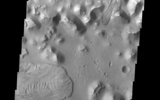 <h1>PIA08485:  Landslides</h1><div class="PIA08485" lang="en" style="width:554px;text-align:left;margin:auto;background-color:#000;padding:10px;max-height:150px;overflow:auto;"><p><a href="/figures/PIA08485_fig1.jpg"></a><br><b>Context image for PIA08485<br />Landslides</b></p><p>The landslides in this image are located in Aurorae Chaos.</p><p>Image information: VIS instrument. Latitude -6.7N, Longitude 328.8E. 18 meter/pixel resolution.</p><p>Please see the <a href="http://themis.asu.edu/terms" target="_blank">THEMIS Data Citation Note</a> for details on crediting THEMIS images. </p><p>Note: this THEMIS visual image has not been radiometrically nor geometrically calibrated for this preliminary release. An empirical correction has been performed to remove instrumental effects. A linear shift has been applied in the cross-track and down-track direction to approximate spacecraft and planetary motion. Fully calibrated and geometrically projected images will be released through the Planetary Data System in accordance with Project policies at a later time.</p><p>NASA's Jet Propulsion Laboratory manages the 2001 Mars Odyssey mission for NASA's Office of Space Science, Washington, D.C. The Thermal Emission Imaging System (THEMIS) was developed by Arizona State University, Tempe, in collaboration with Raytheon Santa Barbara Remote Sensing. The THEMIS investigation is led by Dr. Philip Christensen at Arizona State University. Lockheed Martin Astronautics, Denver, is the prime contractor for the Odyssey project, and developed and built the orbiter. Mission operations are conducted jointly from Lockheed Martin and from JPL, a division of the California Institute of Technology in Pasadena.</p><br /><br /><a href="http://photojournal.jpl.nasa.gov/catalog/PIA08485" onclick="window.open(this.href); return false;" title="Voir l'image 	 PIA08485:  Landslides	  sur le site de la NASA">Voir l'image 	 PIA08485:  Landslides	  sur le site de la NASA.</a></div>