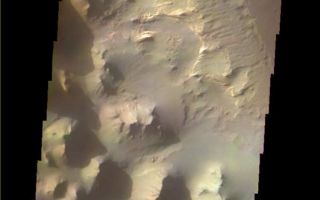 <h1>PIA08586:  Martian Color #2</h1><div class="PIA08586" lang="en" style="width:599px;text-align:left;margin:auto;background-color:#000;padding:10px;max-height:150px;overflow:auto;"><p><a href="/figures/PIA08586_fig1.jpg"></a><br><b>Context image for PIA08586<br />Martian Color #2</b></p><p>This image shows part of Eos Chasma.</p><p>This color treatment is the result of a collaboration between THEMIS team members at Cornell University and space artist Don Davis, who is an expert on true-color renderings of planetary and astronomical objects. Davis began with calibrated and co-registered THEMIS VIS multi-band radiance files produced by the Cornell group. Using as a guide true-color imaging from spacecraft and his own personal experience at Mt. Wilson and other observatories, he performed a manual color balance to display the spectral capabilities of the THEMIS imager within the context of other Mars observations. He also did some manual smoothing along with other image processing to minimize the effects of residual scattered light in the images.</p><p>Image information: VIS instrument. Latitude -16.0N, Longitude 313.1E. 35 meter/pixel resolution.</p><p>Please see the <a href="http://themis.asu.edu/terms" target="_blank">THEMIS Data Citation Note</a> for details on crediting THEMIS images. </p><p>Note: this THEMIS visual image has not been radiometrically nor geometrically calibrated for this preliminary release. An empirical correction has been performed to remove instrumental effects. A linear shift has been applied in the cross-track and down-track direction to approximate spacecraft and planetary motion. Fully calibrated and geometrically projected images will be released through the Planetary Data System in accordance with Project policies at a later time.</p><p>NASA's Jet Propulsion Laboratory manages the 2001 Mars Odyssey mission for NASA's Office of Space Science, Washington, D.C. The Thermal Emission Imaging System (THEMIS) was developed by Arizona State University, Tempe, in collaboration with Raytheon Santa Barbara Remote Sensing. The THEMIS investigation is led by Dr. Philip Christensen at Arizona State University. Lockheed Martin Astronautics, Denver, is the prime contractor for the Odyssey project, and developed and built the orbiter. Mission operations are conducted jointly from Lockheed Martin and from JPL, a division of the California Institute of Technology in Pasadena.</p><br /><br /><a href="http://photojournal.jpl.nasa.gov/catalog/PIA08586" onclick="window.open(this.href); return false;" title="Voir l'image 	 PIA08586:  Martian Color #2	  sur le site de la NASA">Voir l'image 	 PIA08586:  Martian Color #2	  sur le site de la NASA.</a></div>
