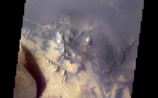 <h1>PIA08589:  Martian Color #5</h1><div class="PIA08589" lang="en" style="width:750px;text-align:left;margin:auto;background-color:#000;padding:10px;max-height:150px;overflow:auto;"><p><a href="/figures/PIA08589_fig1.jpg"></a><br><b>Context image for PIA08589<br />Martian Color #5</b></p><p>This two-image mosaic shows part of the floor of Melas Chasma.</p><p>This color treatment is the result of a collaboration between THEMIS team members at Cornell University and space artist Don Davis, who is an expert on true-color renderings of planetary and astronomical objects. Davis began with calibrated and co-registered THEMIS VIS multi-band radiance files produced by the Cornell group. Using as a guide true-color imaging from spacecraft and his own personal experience at Mt. Wilson and other observatories, he performed a manual color balance to display the spectral capabilities of the THEMIS imager within the context of other Mars observations. He also did some manual smoothing along with other image processing to minimize the effects of residual scattered light in the images.</p><p>Image information: VIS instrument. Latitude -9.9N, Longitude 286.2E. 35 meter/pixel resolution.</p><p>Please see the <a href="http://themis.asu.edu/terms" target="_blank">THEMIS Data Citation Note</a> for details on crediting THEMIS images. </p><p>Note: this THEMIS visual image has not been radiometrically nor geometrically calibrated for this preliminary release. An empirical correction has been performed to remove instrumental effects. A linear shift has been applied in the cross-track and down-track direction to approximate spacecraft and planetary motion. Fully calibrated and geometrically projected images will be released through the Planetary Data System in accordance with Project policies at a later time.</p><p>NASA's Jet Propulsion Laboratory manages the 2001 Mars Odyssey mission for NASA's Office of Space Science, Washington, D.C. The Thermal Emission Imaging System (THEMIS) was developed by Arizona State University, Tempe, in collaboration with Raytheon Santa Barbara Remote Sensing. The THEMIS investigation is led by Dr. Philip Christensen at Arizona State University. Lockheed Martin Astronautics, Denver, is the prime contractor for the Odyssey project, and developed and built the orbiter. Mission operations are conducted jointly from Lockheed Martin and from JPL, a division of the California Institute of Technology in Pasadena.</p><br /><br /><a href="http://photojournal.jpl.nasa.gov/catalog/PIA08589" onclick="window.open(this.href); return false;" title="Voir l'image 	 PIA08589:  Martian Color #5	  sur le site de la NASA">Voir l'image 	 PIA08589:  Martian Color #5	  sur le site de la NASA.</a></div>