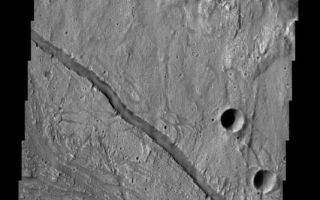 <h1>PIA08595:  Kasei Vallis</h1><div class="PIA08595" lang="en" style="width:534px;text-align:left;margin:auto;background-color:#000;padding:10px;max-height:150px;overflow:auto;"><p><a href="/figures/PIA08595_fig1.jpg"></a><br><b>Context image for PIA08595<br />Kasei Vallis</b></p><p>This crater and surrounding channels are part of Kasei Vallis.</p><p>Image information: VIS instrument. Latitude 28.0N, Longitude 308.9E. 19 meter/pixel resolution.</p><p>Please see the <a href="http://themis.asu.edu/terms" target="_blank">THEMIS Data Citation Note</a> for details on crediting THEMIS images. </p><p>Note: this THEMIS visual image has not been radiometrically nor geometrically calibrated for this preliminary release. An empirical correction has been performed to remove instrumental effects. A linear shift has been applied in the cross-track and down-track direction to approximate spacecraft and planetary motion. Fully calibrated and geometrically projected images will be released through the Planetary Data System in accordance with Project policies at a later time.</p><p>NASA's Jet Propulsion Laboratory manages the 2001 Mars Odyssey mission for NASA's Office of Space Science, Washington, D.C. The Thermal Emission Imaging System (THEMIS) was developed by Arizona State University, Tempe, in collaboration with Raytheon Santa Barbara Remote Sensing. The THEMIS investigation is led by Dr. Philip Christensen at Arizona State University. Lockheed Martin Astronautics, Denver, is the prime contractor for the Odyssey project, and developed and built the orbiter. Mission operations are conducted jointly from Lockheed Martin and from JPL, a division of the California Institute of Technology in Pasadena.</p><br /><br /><a href="http://photojournal.jpl.nasa.gov/catalog/PIA08595" onclick="window.open(this.href); return false;" title="Voir l'image 	 PIA08595:  Kasei Vallis	  sur le site de la NASA">Voir l'image 	 PIA08595:  Kasei Vallis	  sur le site de la NASA.</a></div>