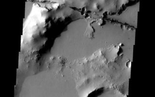 <h1>PIA08609:  Cerberus Fossae</h1><div class="PIA08609" lang="en" style="width:568px;text-align:left;margin:auto;background-color:#000;padding:10px;max-height:150px;overflow:auto;"><p><a href="/figures/PIA08609_fig1.jpg"></a><br><b>Context image for PIA08609<br />Cerberus Fossae</b></p><p>One of the Cerberus Fossae fractures cuts through the plains and highlands in this image.</p><p>Image information: VIS instrument. Latitude 8.5N, Longitude 159.7E. 18 meter/pixel resolution.</p><p>Please see the <a href="http://themis.asu.edu/terms" target="_blank">THEMIS Data Citation Note</a> for details on crediting THEMIS images. </p><p>Note: this THEMIS visual image has not been radiometrically nor geometrically calibrated for this preliminary release. An empirical correction has been performed to remove instrumental effects. A linear shift has been applied in the cross-track and down-track direction to approximate spacecraft and planetary motion. Fully calibrated and geometrically projected images will be released through the Planetary Data System in accordance with Project policies at a later time.</p><p>NASA's Jet Propulsion Laboratory manages the 2001 Mars Odyssey mission for NASA's Office of Space Science, Washington, D.C. The Thermal Emission Imaging System (THEMIS) was developed by Arizona State University, Tempe, in collaboration with Raytheon Santa Barbara Remote Sensing. The THEMIS investigation is led by Dr. Philip Christensen at Arizona State University. Lockheed Martin Astronautics, Denver, is the prime contractor for the Odyssey project, and developed and built the orbiter. Mission operations are conducted jointly from Lockheed Martin and from JPL, a division of the California Institute of Technology in Pasadena.</p><br /><br /><a href="http://photojournal.jpl.nasa.gov/catalog/PIA08609" onclick="window.open(this.href); return false;" title="Voir l'image 	 PIA08609:  Cerberus Fossae	  sur le site de la NASA">Voir l'image 	 PIA08609:  Cerberus Fossae	  sur le site de la NASA.</a></div>
