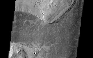 <h1>PIA08684:  Marte Vallis</h1><div class="PIA08684" lang="en" style="width:567px;text-align:left;margin:auto;background-color:#000;padding:10px;max-height:150px;overflow:auto;"><p><a href="/figures/PIA08684_fig1.jpg"></a><br><b>Context image for PIA08684<br />Marte Vallis></b></p><p>The dark platy lava flow in this image is confined to a channel.</p><p>Image information: VIS instrument. Latitude 10.9N, Longitude 182.0E. 18 meter/pixel resolution.</p><p>Please see the <a href="http://themis.asu.edu/terms" target="_blank">THEMIS Data Citation Note</a> for details on crediting THEMIS images. </p><p>Note: this THEMIS visual image has not been radiometrically nor geometrically calibrated for this preliminary release. An empirical correction has been performed to remove instrumental effects. A linear shift has been applied in the cross-track and down-track direction to approximate spacecraft and planetary motion. Fully calibrated and geometrically projected images will be released through the Planetary Data System in accordance with Project policies at a later time.</p><p>NASA's Jet Propulsion Laboratory manages the 2001 Mars Odyssey mission for NASA's Office of Space Science, Washington, D.C. The Thermal Emission Imaging System (THEMIS) was developed by Arizona State University, Tempe, in collaboration with Raytheon Santa Barbara Remote Sensing. The THEMIS investigation is led by Dr. Philip Christensen at Arizona State University. Lockheed Martin Astronautics, Denver, is the prime contractor for the Odyssey project, and developed and built the orbiter. Mission operations are conducted jointly from Lockheed Martin and from JPL, a division of the California Institute of Technology in Pasadena.</p><br /><br /><a href="http://photojournal.jpl.nasa.gov/catalog/PIA08684" onclick="window.open(this.href); return false;" title="Voir l'image 	 PIA08684:  Marte Vallis	  sur le site de la NASA">Voir l'image 	 PIA08684:  Marte Vallis	  sur le site de la NASA.</a></div>