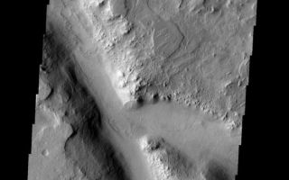 <h1>PIA08689:  Channel Dunes</h1><div class="PIA08689" lang="en" style="width:587px;text-align:left;margin:auto;background-color:#000;padding:10px;max-height:150px;overflow:auto;"><p><a href="/figures/PIA08689_fig1.jpg"></a><br><b>Context image for PIA08689<br />Channel Dunes ></b></p><p>Sand dunes cover the floor of this channel in Terra Sabaea.</p><p>Image information: VIS instrument. Latitude 31.5N, Longitude 64.9E. 19 meter/pixel resolution.</p><p>Please see the <a href="http://themis.asu.edu/terms" target="_blank">THEMIS Data Citation Note</a> for details on crediting THEMIS images. </p><p>Note: this THEMIS visual image has not been radiometrically nor geometrically calibrated for this preliminary release. An empirical correction has been performed to remove instrumental effects. A linear shift has been applied in the cross-track and down-track direction to approximate spacecraft and planetary motion. Fully calibrated and geometrically projected images will be released through the Planetary Data System in accordance with Project policies at a later time.</p><p>NASA's Jet Propulsion Laboratory manages the 2001 Mars Odyssey mission for NASA's Office of Space Science, Washington, D.C. The Thermal Emission Imaging System (THEMIS) was developed by Arizona State University, Tempe, in collaboration with Raytheon Santa Barbara Remote Sensing. The THEMIS investigation is led by Dr. Philip Christensen at Arizona State University. Lockheed Martin Astronautics, Denver, is the prime contractor for the Odyssey project, and developed and built the orbiter. Mission operations are conducted jointly from Lockheed Martin and from JPL, a division of the California Institute of Technology in Pasadena.</p><br /><br /><a href="http://photojournal.jpl.nasa.gov/catalog/PIA08689" onclick="window.open(this.href); return false;" title="Voir l'image 	 PIA08689:  Channel Dunes	  sur le site de la NASA">Voir l'image 	 PIA08689:  Channel Dunes	  sur le site de la NASA.</a></div>