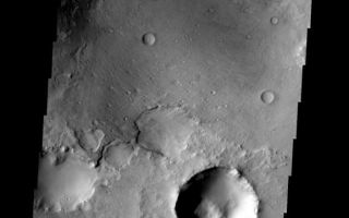 <h1>PIA08691:  Crater Fill</h1><div class="PIA08691" lang="en" style="width:577px;text-align:left;margin:auto;background-color:#000;padding:10px;max-height:150px;overflow:auto;"><p><a href="/figures/PIA08691_fig1.jpg"></a><br><b>Context image for PIA08691<br />Crater Fill></b></p><p>This crater, on the northern margin of Syrtis Major, has been filled with material that is now being removed.</p><p>Image information: VIS instrument. Latitude 23.6N, Longitude 70.7E. 18 meter/pixel resolution.</p><p>Please see the <a href="http://themis.asu.edu/terms" target="_blank">THEMIS Data Citation Note</a> for details on crediting THEMIS images. </p><p>Note: this THEMIS visual image has not been radiometrically nor geometrically calibrated for this preliminary release. An empirical correction has been performed to remove instrumental effects. A linear shift has been applied in the cross-track and down-track direction to approximate spacecraft and planetary motion. Fully calibrated and geometrically projected images will be released through the Planetary Data System in accordance with Project policies at a later time.</p><p>NASA's Jet Propulsion Laboratory manages the 2001 Mars Odyssey mission for NASA's Office of Space Science, Washington, D.C. The Thermal Emission Imaging System (THEMIS) was developed by Arizona State University, Tempe, in collaboration with Raytheon Santa Barbara Remote Sensing. The THEMIS investigation is led by Dr. Philip Christensen at Arizona State University. Lockheed Martin Astronautics, Denver, is the prime contractor for the Odyssey project, and developed and built the orbiter. Mission operations are conducted jointly from Lockheed Martin and from JPL, a division of the California Institute of Technology in Pasadena.</p><br /><br /><a href="http://photojournal.jpl.nasa.gov/catalog/PIA08691" onclick="window.open(this.href); return false;" title="Voir l'image 	 PIA08691:  Crater Fill	  sur le site de la NASA">Voir l'image 	 PIA08691:  Crater Fill	  sur le site de la NASA.</a></div>
